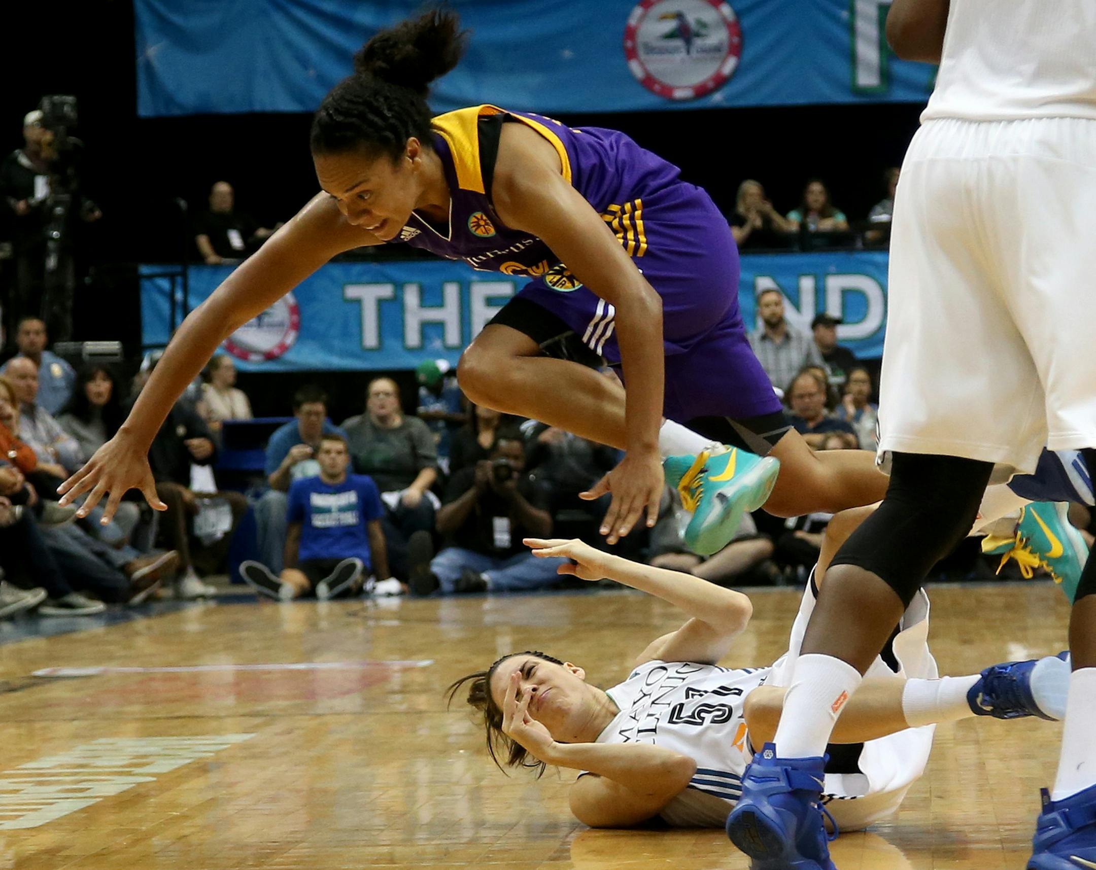 Lynx Anna Cruz got fouled by Sparks Kristi Toliver in the second half. ] (KYNDELL HARKNESS/STAR TRIBUNE) kyndell.harkness@startribune.com Lynx vs LA Sparks during the first round of the WNBA Playoffs at Target Center in Minneapolis Min., Friday September 18, 2015.Lynx won over Sparks 67-65.