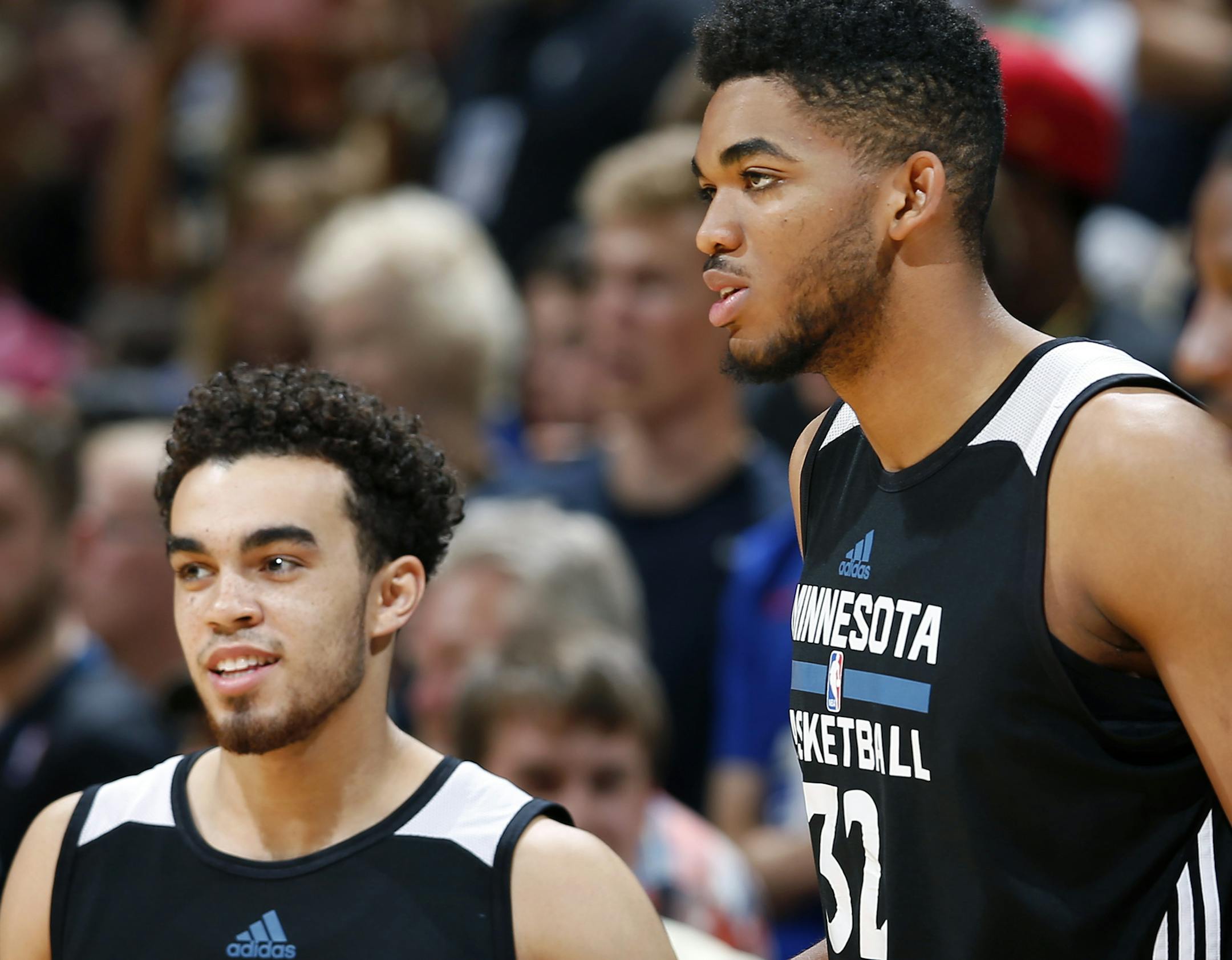 Wolves top picks Karl-Anthony Towns, right, and Apple Valley’s Tyus Jones were two of the young players fans turned out in droves to see Wednesday.