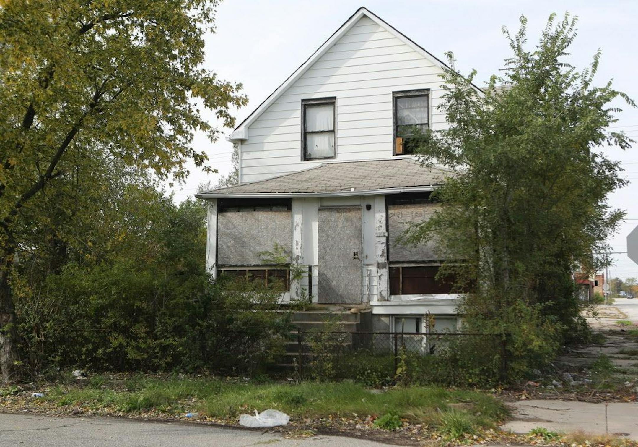 One of the homes in which a body was found is seen Monday, Oct. 20, 2014, at 2200 Massachusetts St. in Gary, Ind.