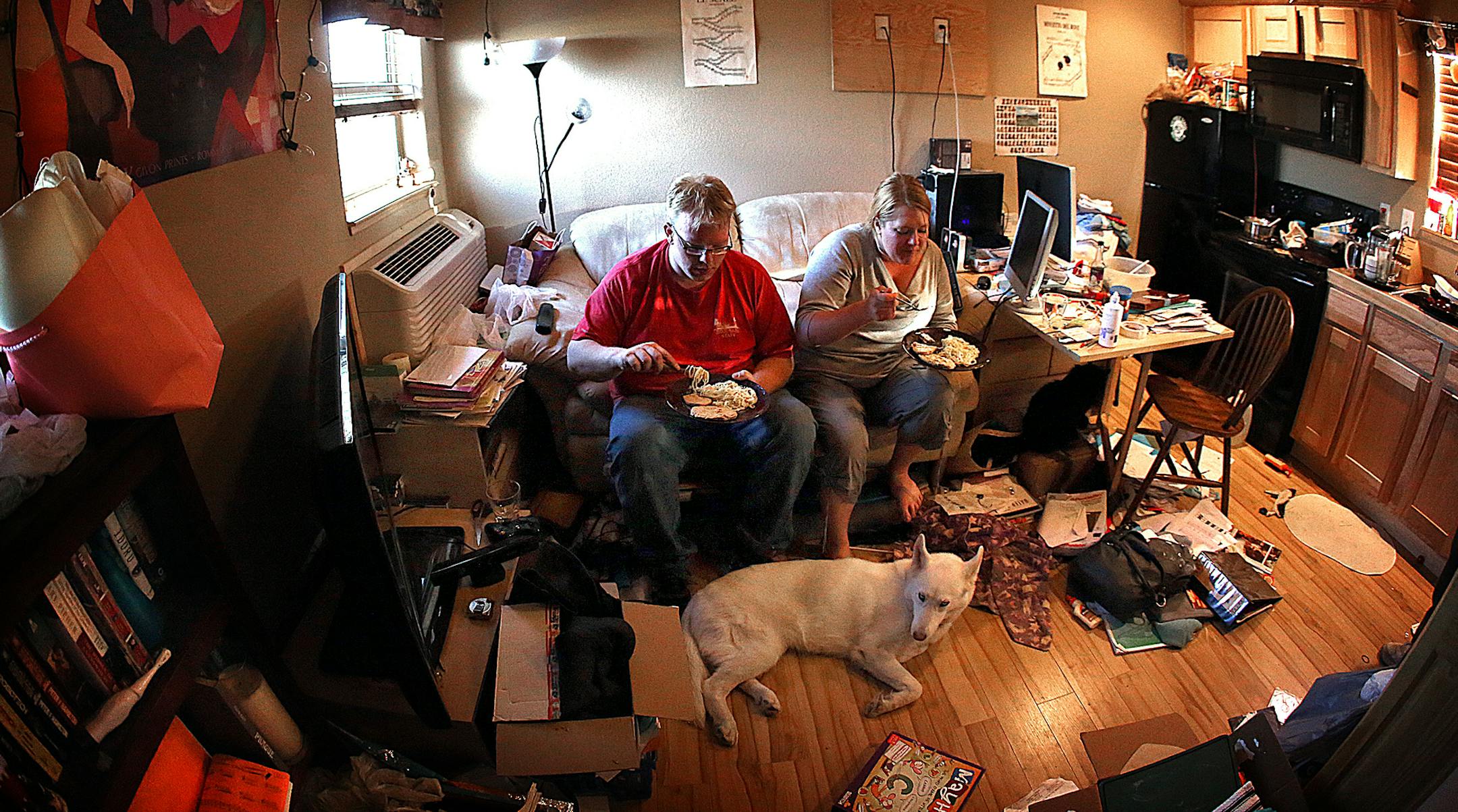 Kroshus and his fianc√©, Trisha, stayed in a 400 square foot, one-third trailer at the Hexco man camp and paid $1,800 a month in rent. ] (JIM GEHRZ/STAR TRIBUNE) / December 17, 2013, Williston, ND ‚Äì BACKGROUND INFORMATION- PHOTOS FOR USE IN FINAL PART OF NORTH DAKOTA OIL BOOM PROJECT: Nathan Kroshus moved from Minnesota to the Bakken oil region as he follows his passion to be a music teacher.