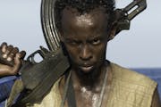 This photo released by Sony - Columbia Pictures shows Barkhad Abdi in a scene from the film, "Captain Phillips. Abdi was nominated for a Golden Globe 