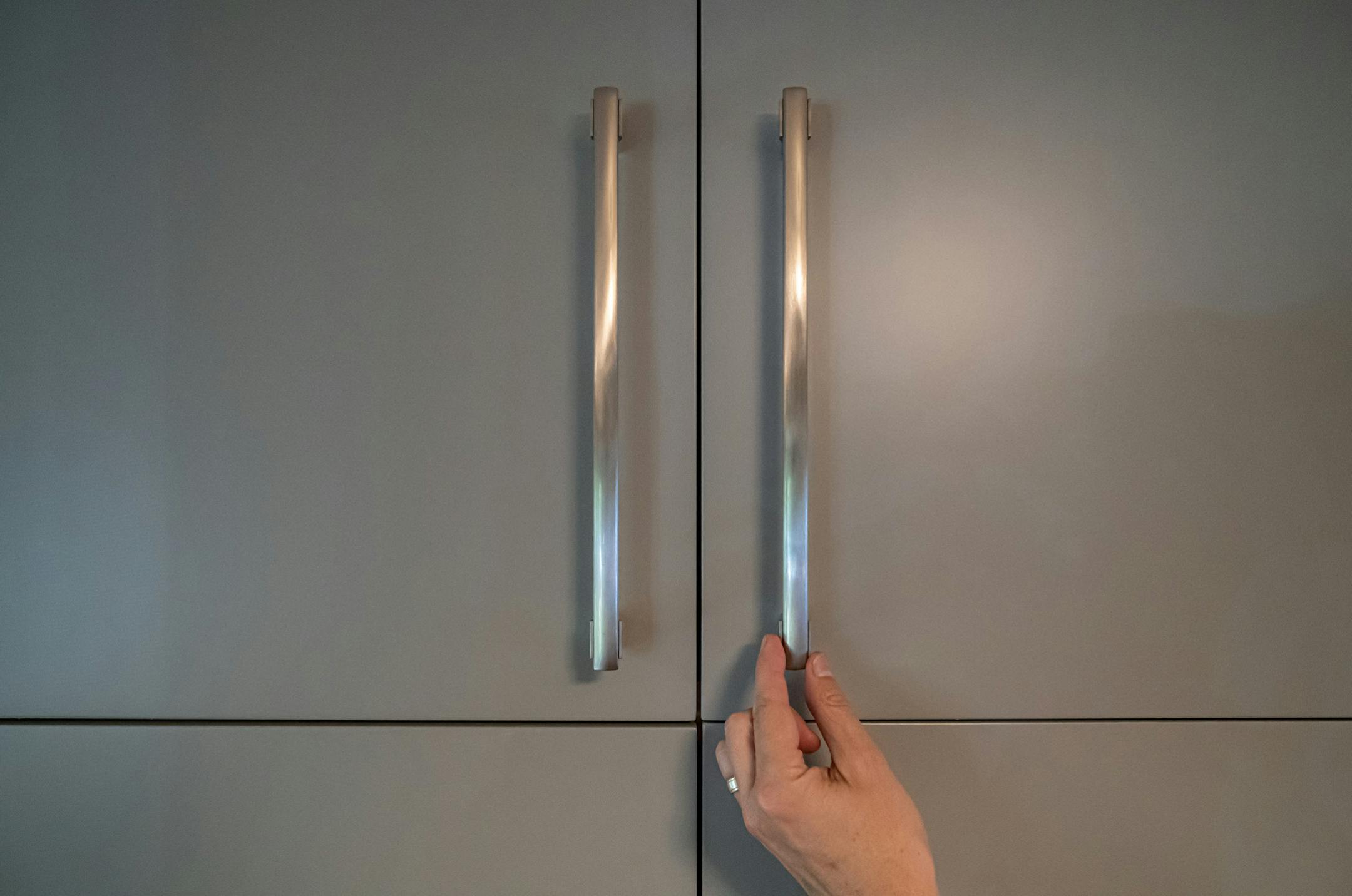 Brushed nickel cabinet hardware. This midcentury rambler in Mendota Heights updated inside and out with reconfigured floor plan, bigger windows and modern functionality, by Mark Larson, Rehkamp Larson Architects. ] GLEN STUBBE • glen.stubbe@startribune.com Thursday, October 17, 2019 Home of the Month - Midcentury rambler in Mendota Heights updated inside and out with reconfigured floor plan, bigger windows and modern functionality, by Mark Larson, Rehkamp Larson Architects. Underwood What