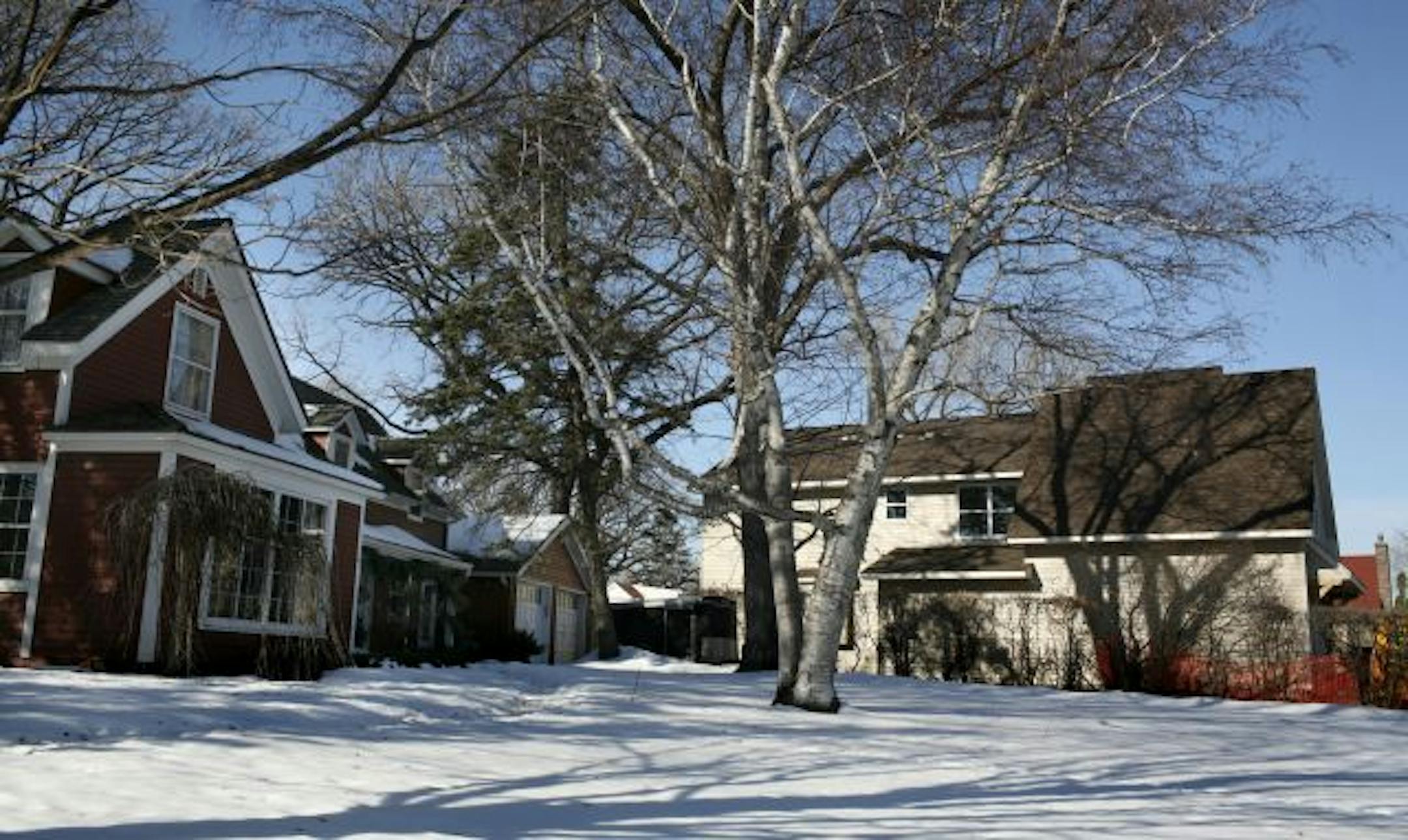 Neighbors along Brookview Avenue S. in Edina are upset with new home construction on their block that they say does not fit the character of the neighborhood and violates city rules. The new home is next door to one of the oldest homes in Edina, Dick and Jackie Whitbeck's historic farmhouse, at left.