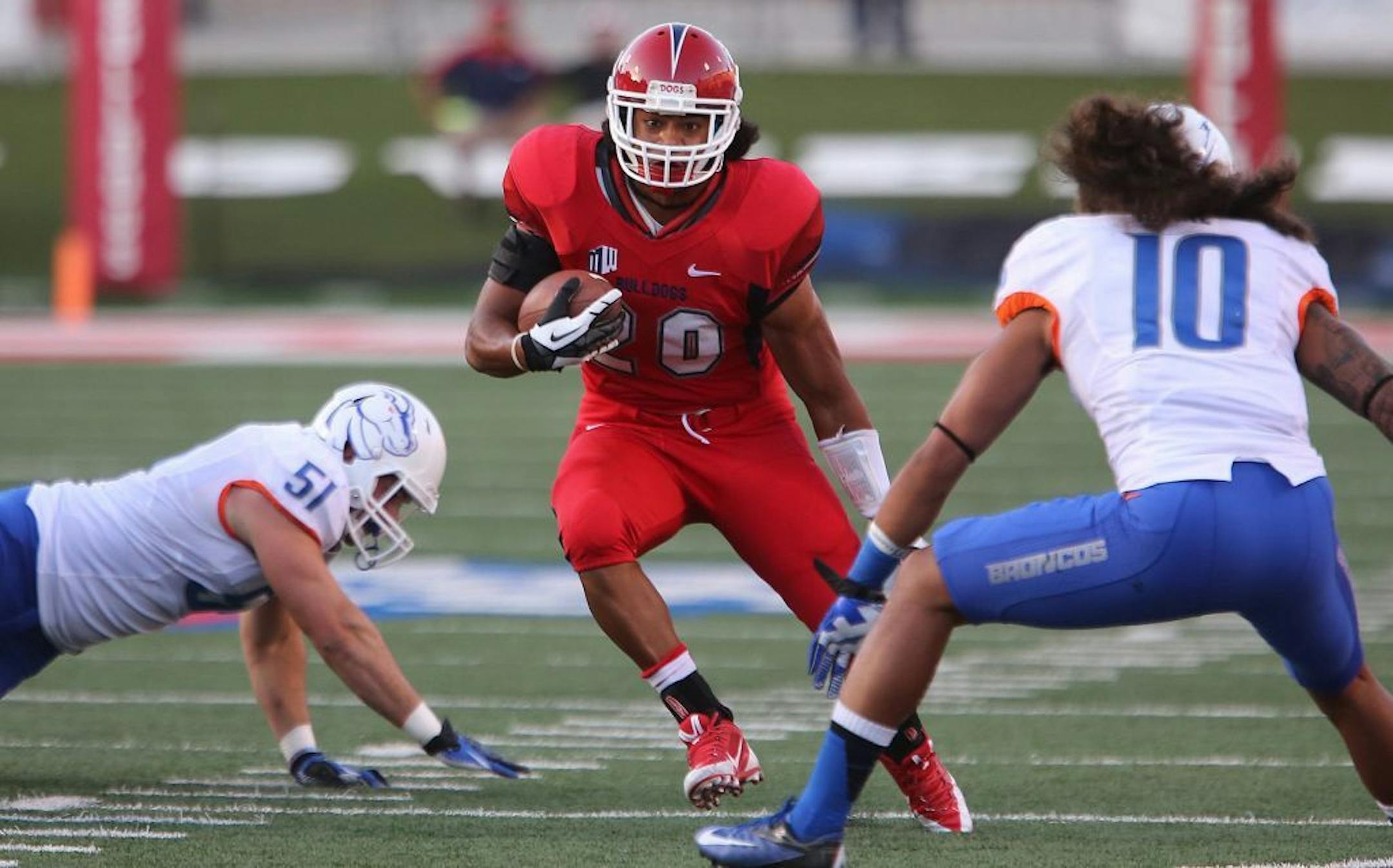 Fresno State's Josh Quezada makes his way to the end zone with a 14-yard touchdown reception against Boise State in the first quarter at Bulldog Stadium in Fresno, California, on Friday, September 20, 2013.
