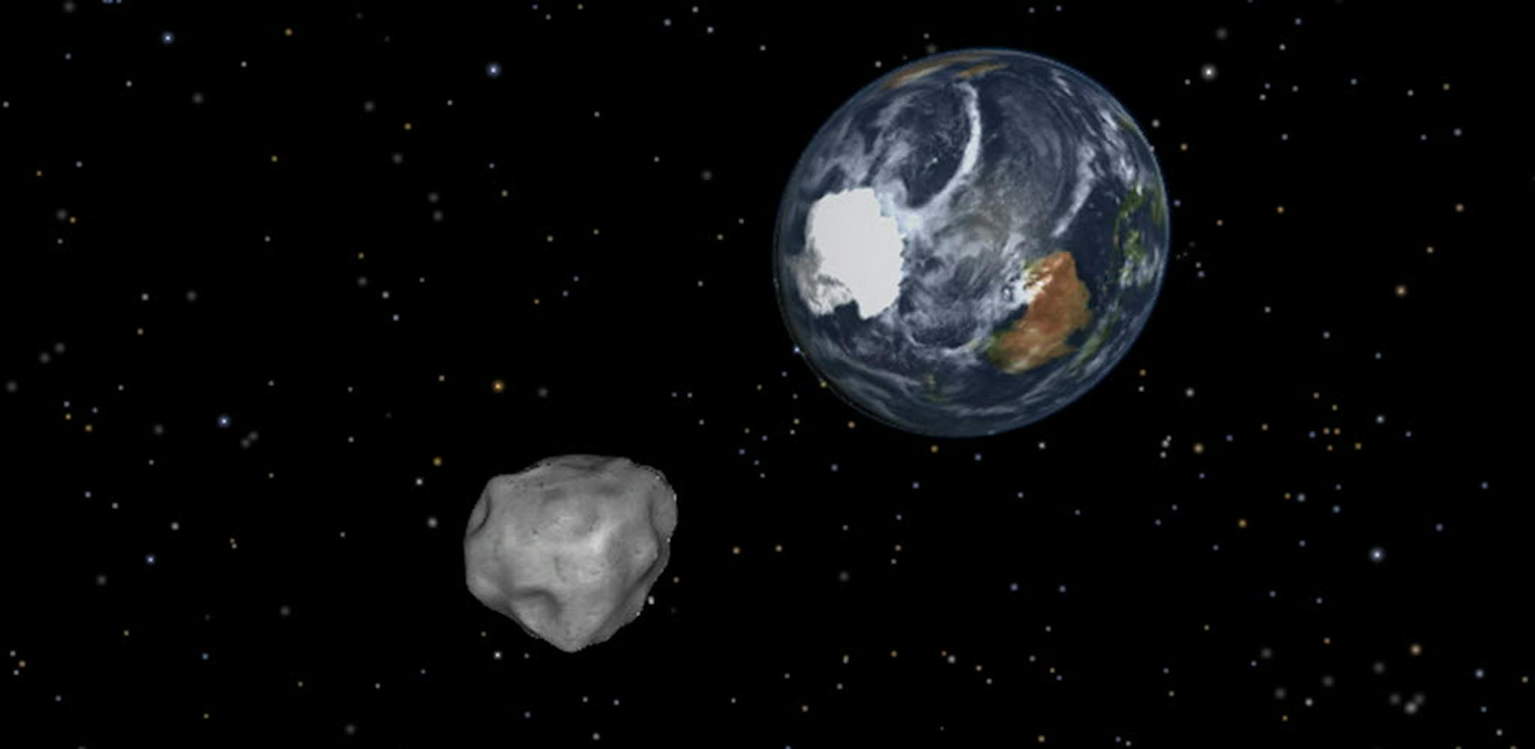 This image shows a simulation of asteroid 2012 DA14 approaching from the south as it passes through the Earth-moon system.