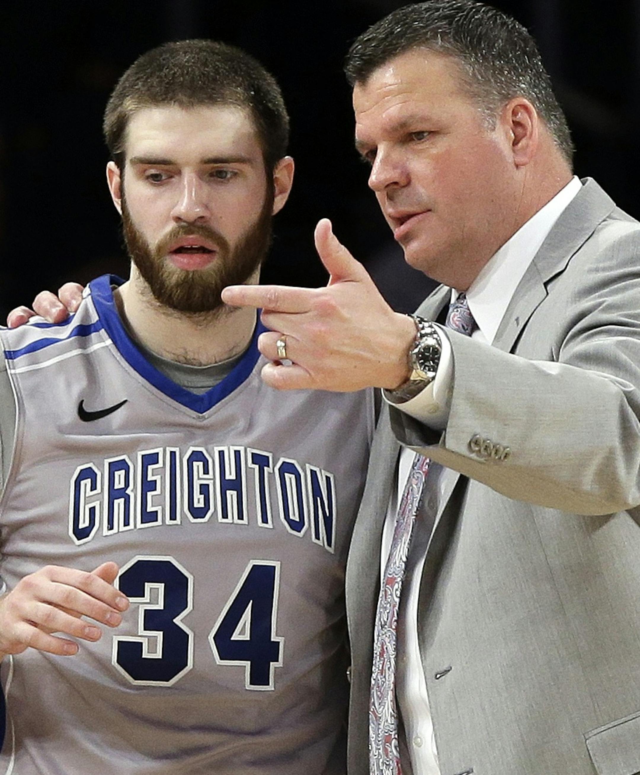 Creighton head coach Greg McDermott talks to Ethan Wragge (34) during the first half of an NCAA college basketball game in the semifinals of the Big East Conference men's tournament Friday, March 14, 2014, at Madison Square Garden in New York. (AP Photo/Frank Franklin II)