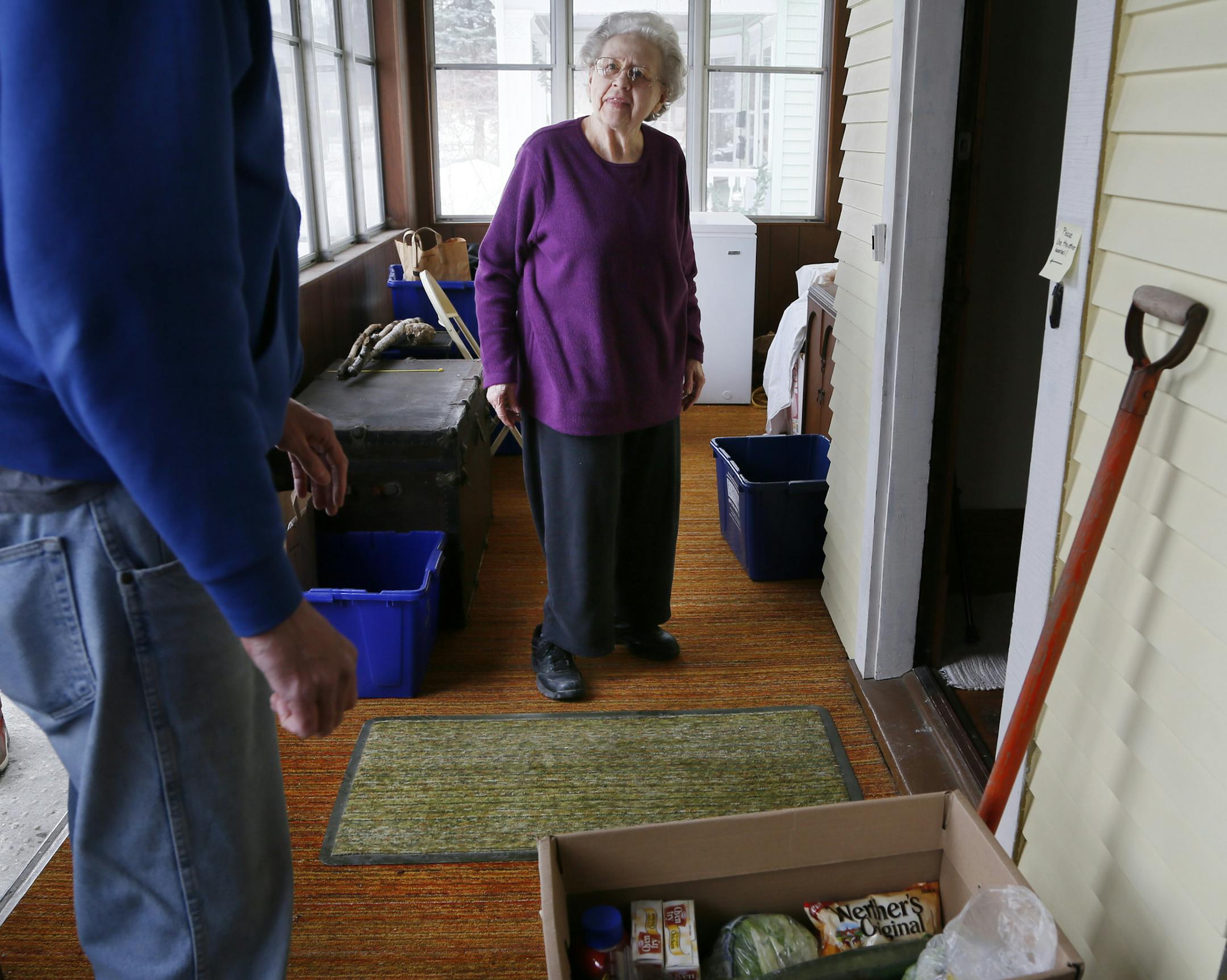 John Bauer an employee of Store To Door deliver service delivered grocery to Mary Arendt at her home in St. Paul March 11, 2014 in St. Paul, Minnesota .] JERRY HOLT jerry.holt@startribune.com Jerry Holt