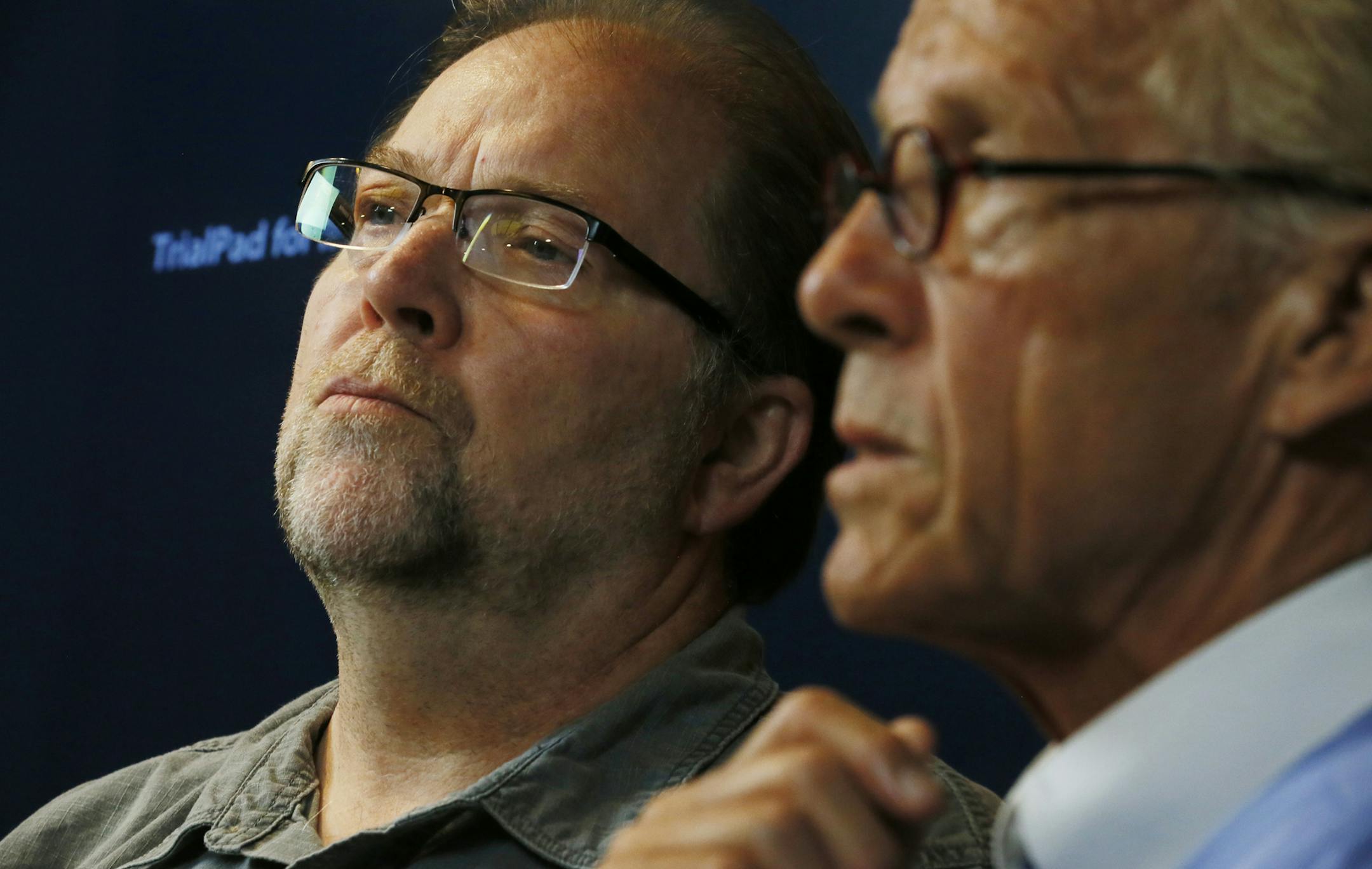 David Pususta left, with his attorney Jeff Anderson held a news conference on Wednesday, July 10, 2013.