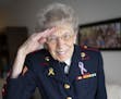 June Fremont proudly saluted in the finely fitting Marine Corps uniform. For the annual Marine birthday ball in 2017, she wore a friend's jacket (thou
