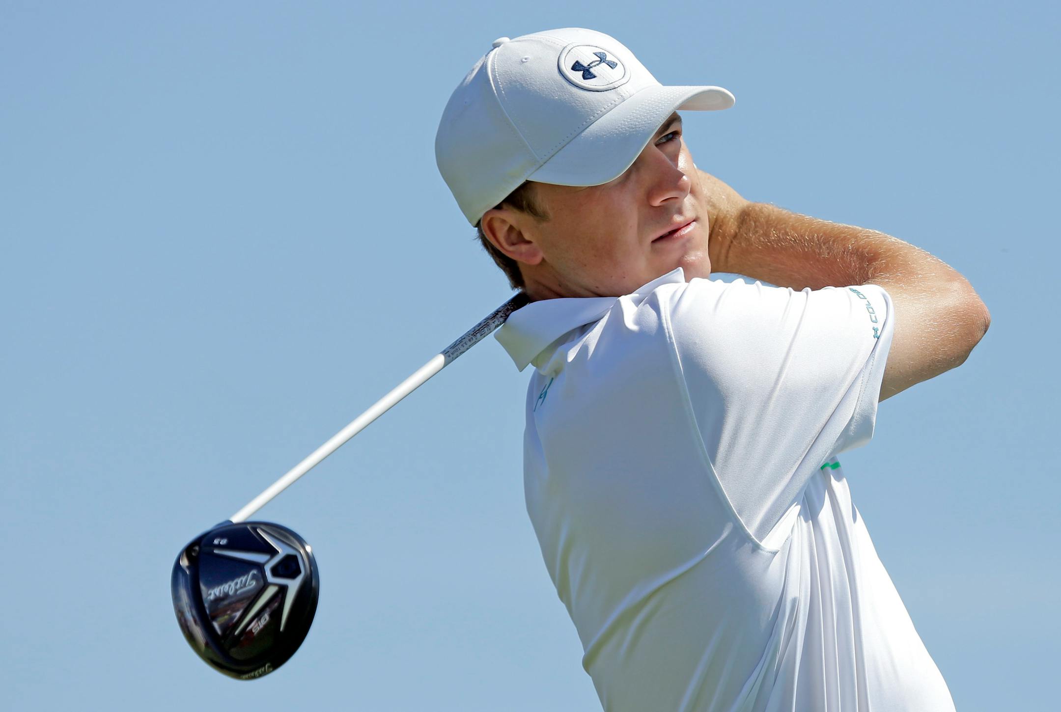 Jordan Spieth tees off on the 3rd hole on Wednesday, Aug. 12, 2015, during practice rounds in preparation for the PGA Championship this week at Whistling Straits in Haven, Wis.