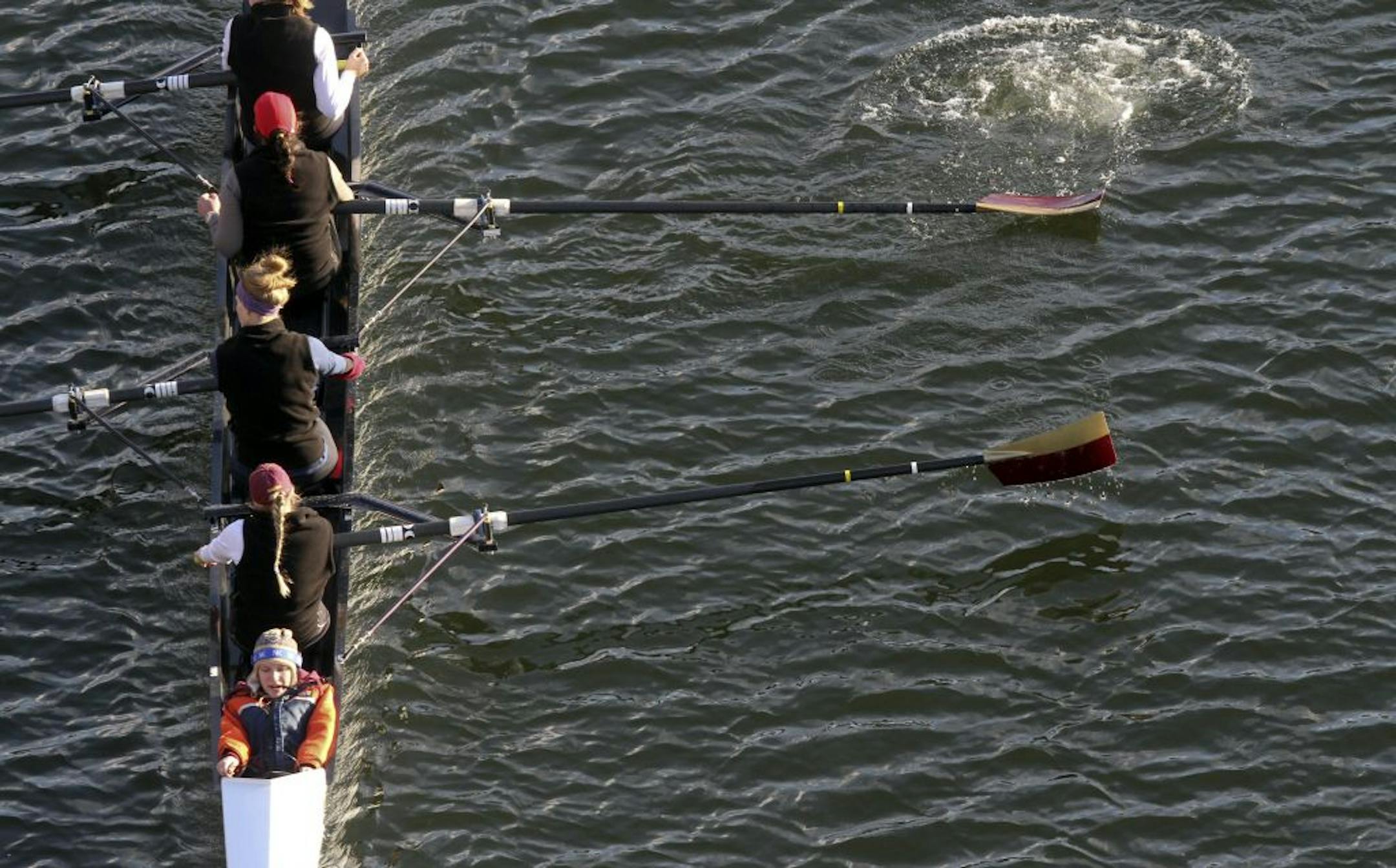The University of Minnesota women's rowing team practiced on the Mississippi River in Minneapolis on Thursday. Last year the team wasn't able to practice on the water until April.