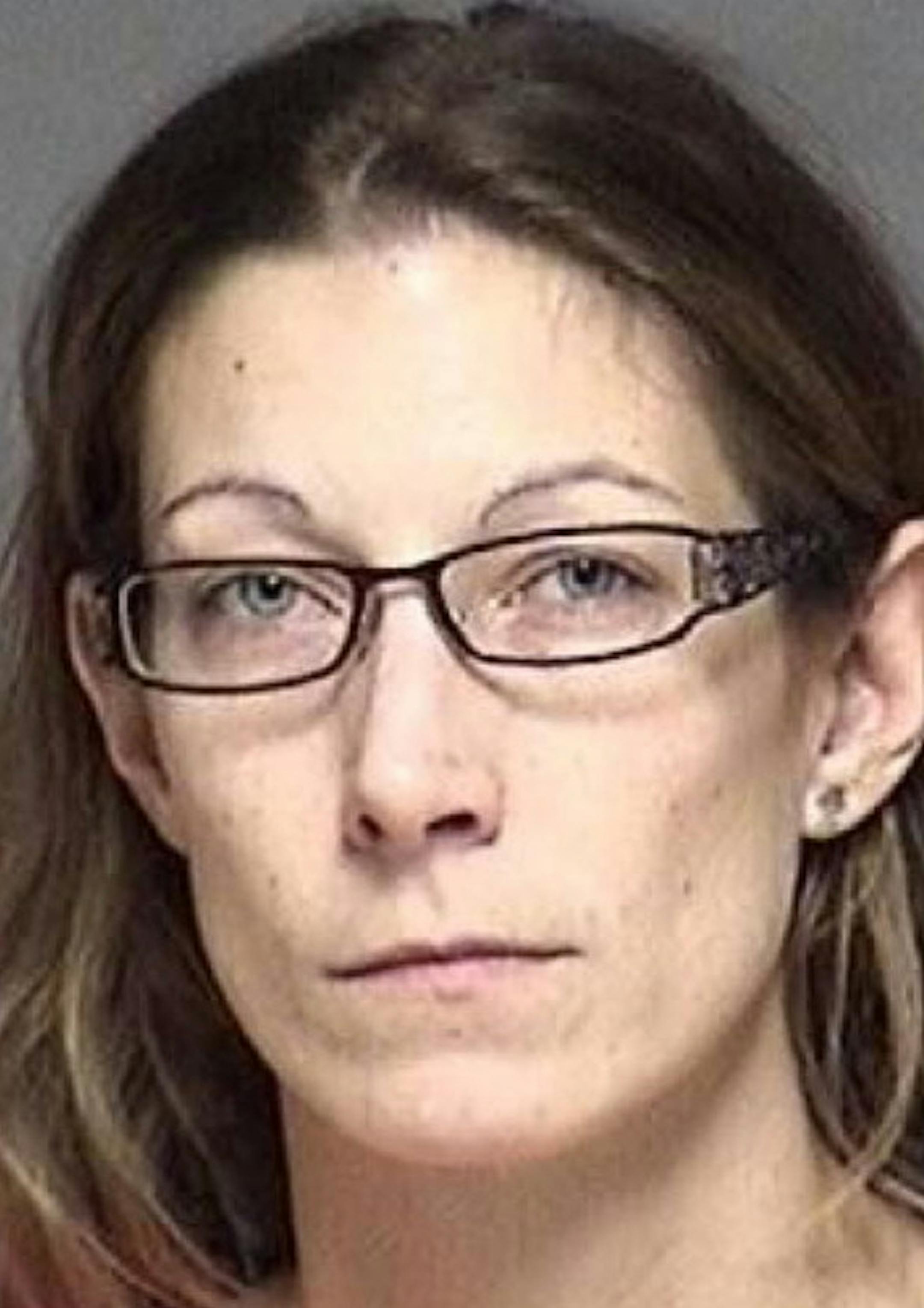 Dawn Pfister, file photo from 2014 arrest in Rochester.