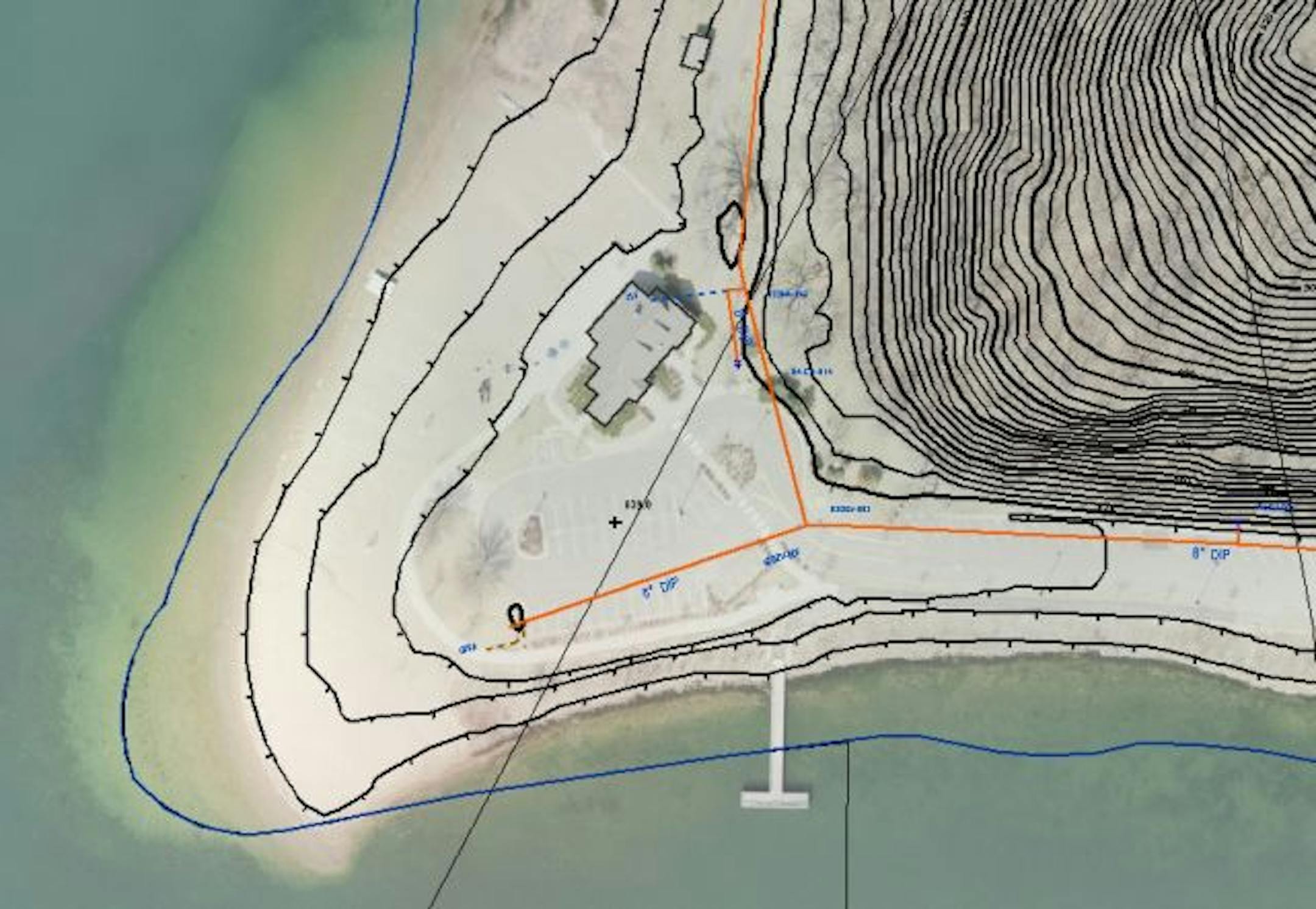 This aerial photo shows a Bush Lake beach shelter. The blue line is a property line; the black lines show elevation.