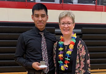 Alex Mazariegos with Melanie Loy following the final concert of his senior year, which included the Hawaiian/ukulele version of “Somewhere Over the 