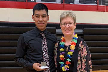 Alex Mazariegos with Melanie Loy following the final concert of his senior year, which included the Hawaiian/ukulele version of “Somewhere Over the 