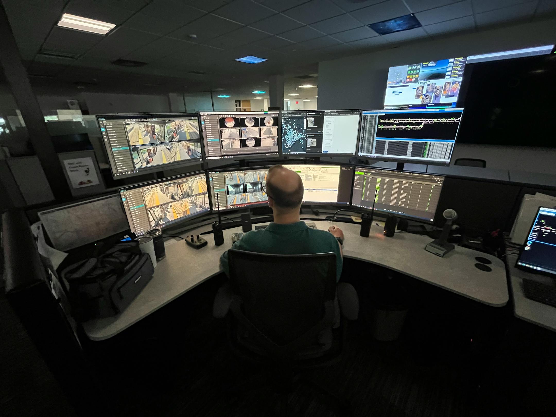 Dan Flynn, a real-time information specialist for Metro Transit, monitors camera feeds.