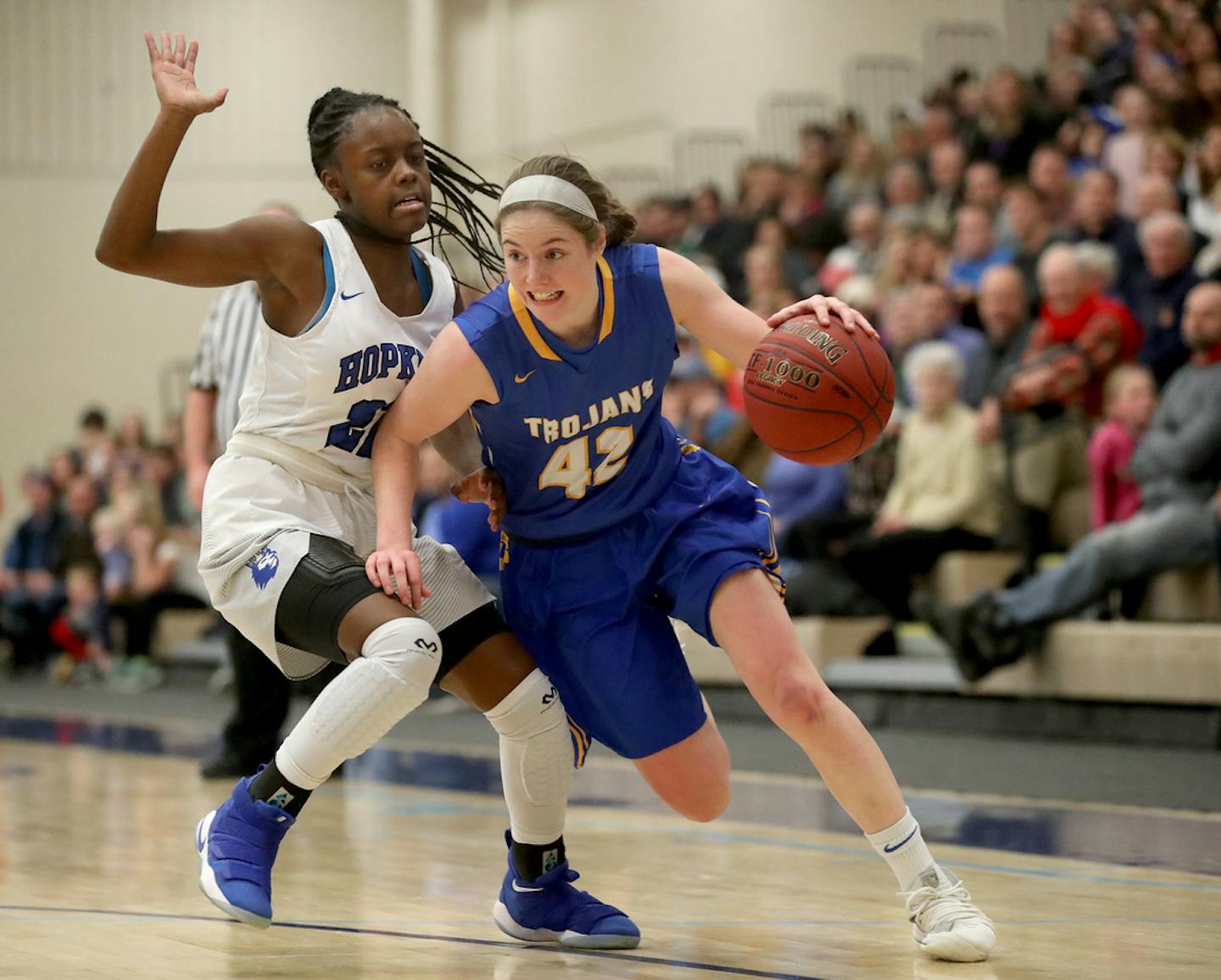 Wayzata's Mimi Schrader (42) drives to the basket while being covered by Hopkins' Kayla Adams (22) during the second half of the Girls' baskeball game at Wayzata High Friday, Jan 12, 2018, in Plymouth , MN. Wayzata came back from a 20 plus point deficit to beat Hopkins 70-66.] DAVID JOLES • david.joles@startribune.com Girls' baskeball, Hopkins at Wayzata