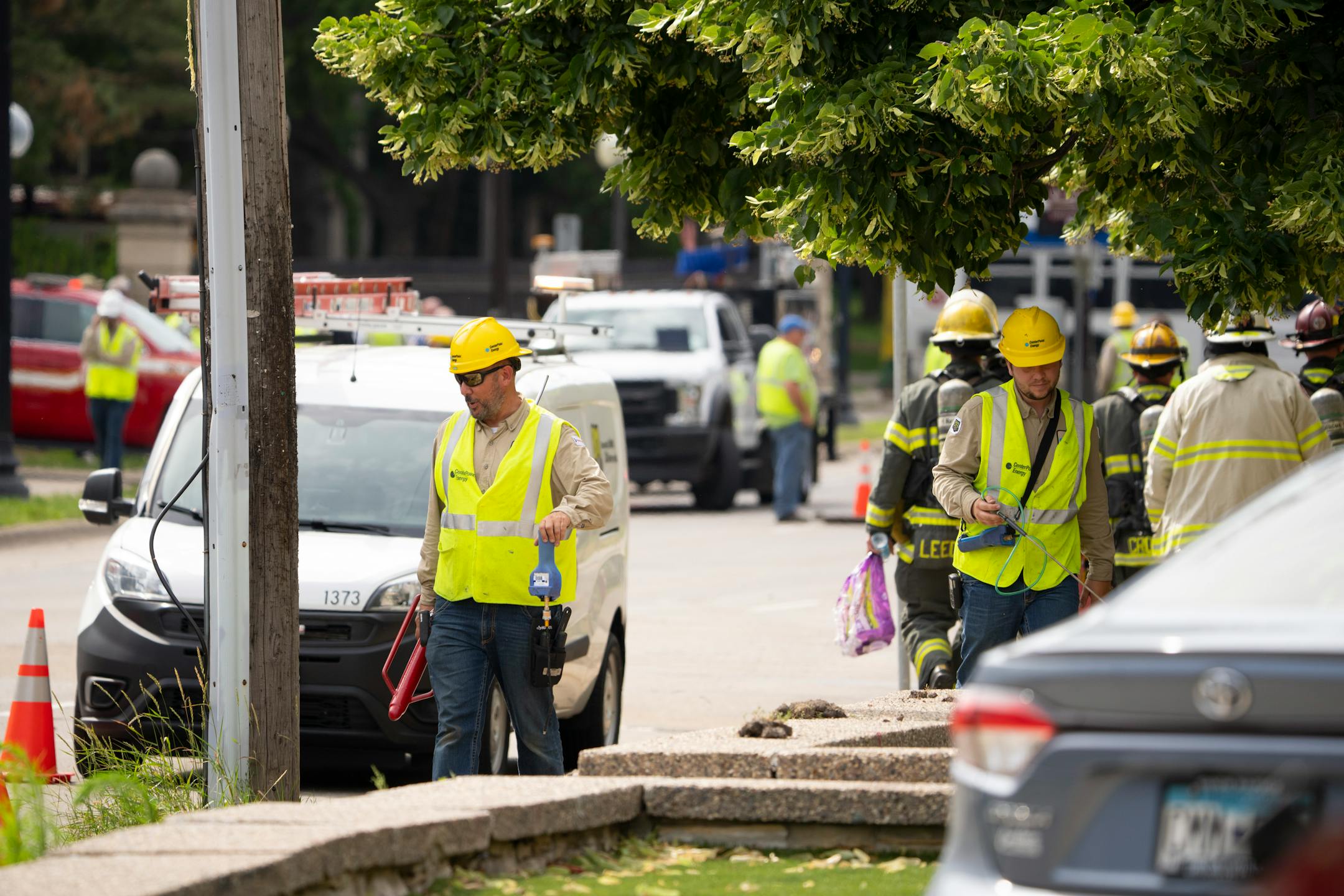 CenterPoint Energy personnel used equipment to test for gas along University Ave. near where the suspected gas leak was first reported Thursday afternoon in Minneapolis. A suspected gas leak resulted in the evacuation of fraternity houses on University Ave. SE across from the U of M campus.