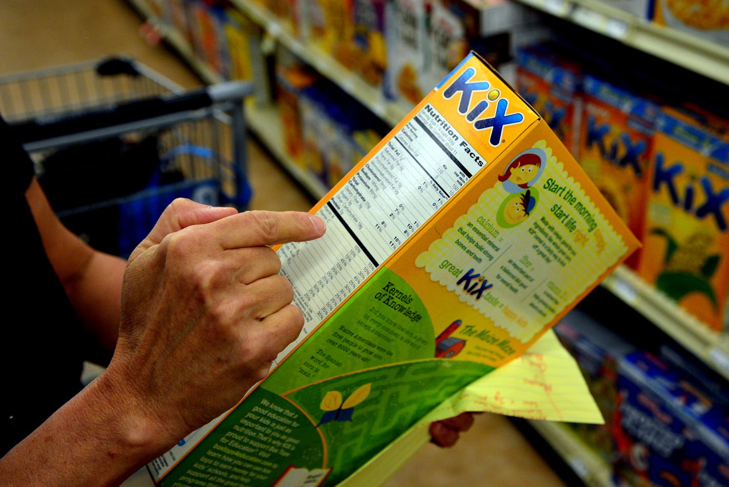 Law Professor Donna Byrne, of William Mitchelll College of Law has studied food labels for years, amassing a trove of them and has some tips for reading them wisely. She looked over the shelves at Oxendale Market for some trends in product labeling. These are some labels from her collection] Richard.Sennott@startribune.com Richard Sennott/Star Tribune Minneapolis Minn. Monday 6/23/2014) ** (cq)