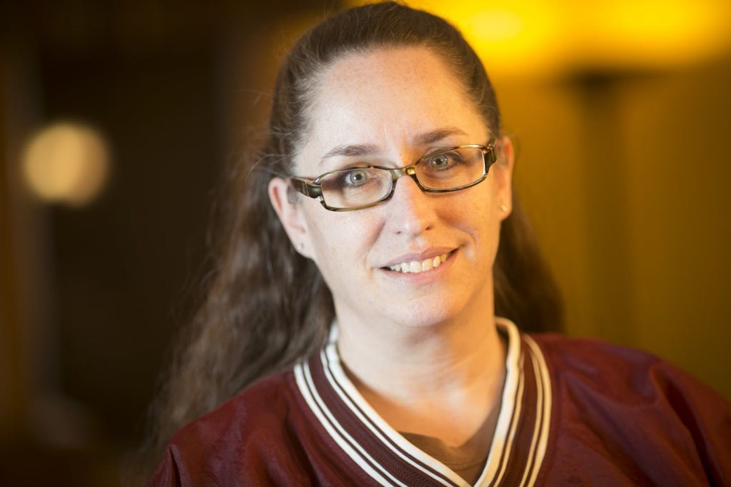 Amy Nicholas has more than 60K in debt from her bachelor's degree. She was photographed at home on Thursday, January 14, 2015, in Elk River, Minn. She graduated from Augsburg College last month.