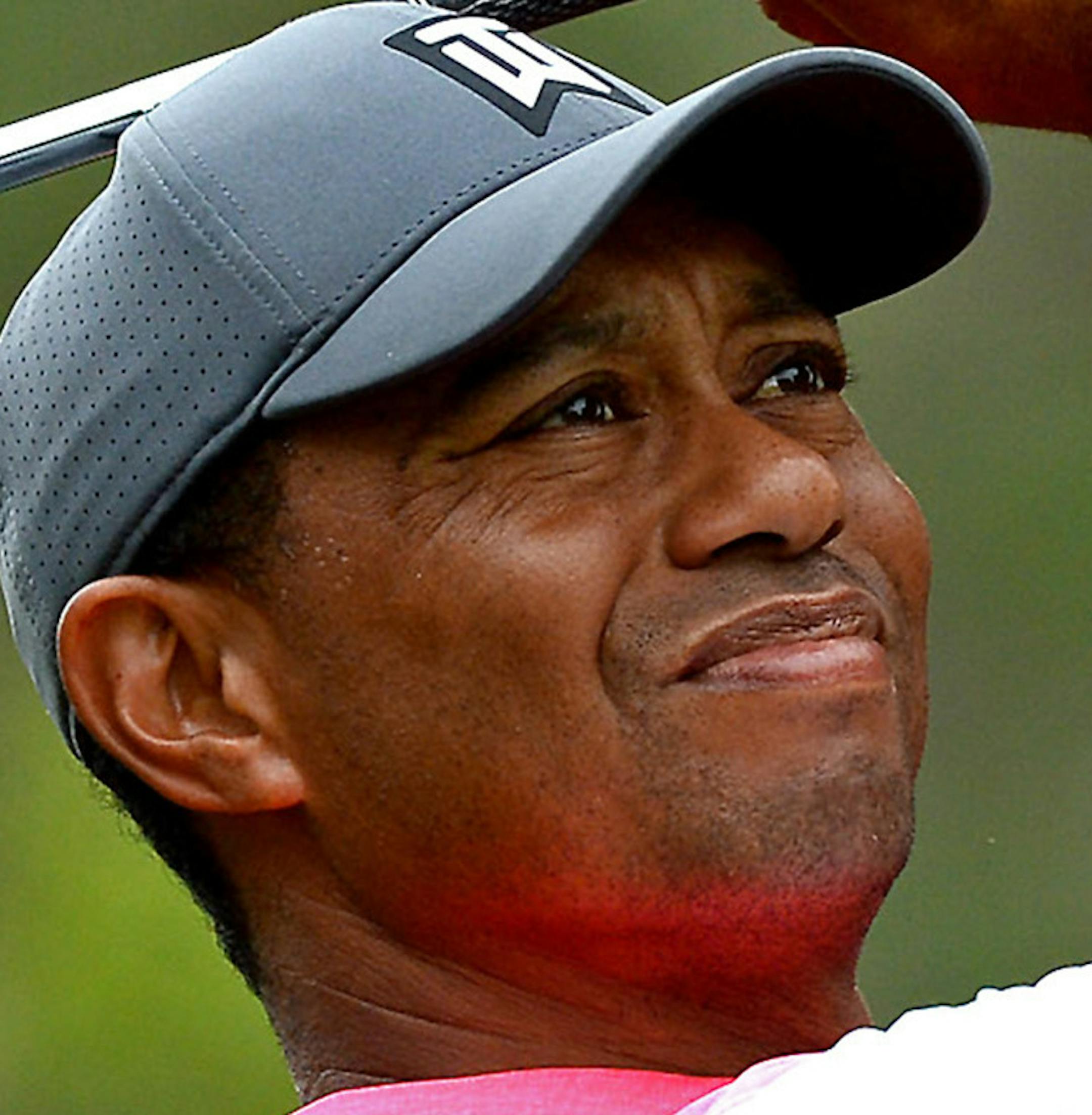 In a May 5, 2018, file image, Tiger Woods watches the flight of his ball from the 6th tee at Quail Hollow Club in Charlotte, N.C., during third-round action in the Wells Fargo Championship. On Saturday, May 12, 2018, he carded a 7-under 65 at TPC Sawgrass in the third round of the Players Championship. (Jeff Siner/Charlotte Observer/TNS) ORG XMIT: 1230991