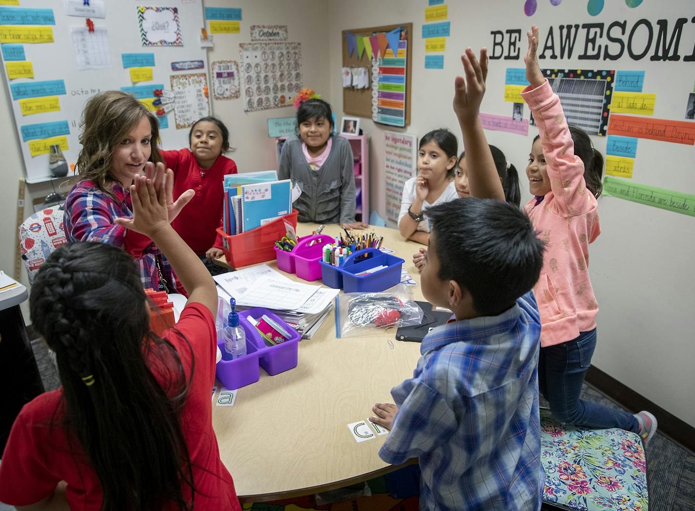 At Prairie Elementary in Worthington, teacher Molly Scheidt led her English language class in a converted storage room. The city's schools are bursting at the seams, but voters have consistently rejected more funding.