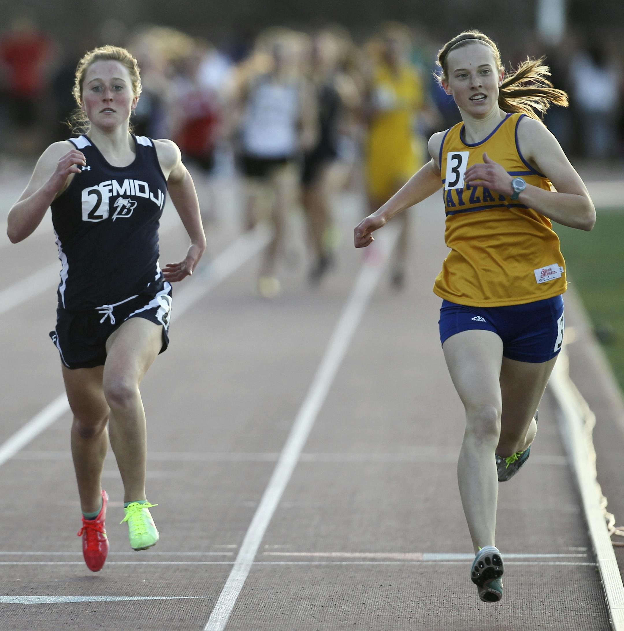 Anna French of Wayzata High bested Jenna Truedson of Bemidji in the girls 1600 meter run at the Hamline Elite track meet Friday, April 25, 2014, at Hamline University in St. Paul, MN](DAVID JOLES/STARTRIBUNE) djoles@startribune.com Hamline Elite track meet**Anna French, Jenna Truedson,cq