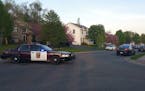 Police cars filled Mayfield Avenue Ne. after reports of the shooting in St. Michael on Saturday.