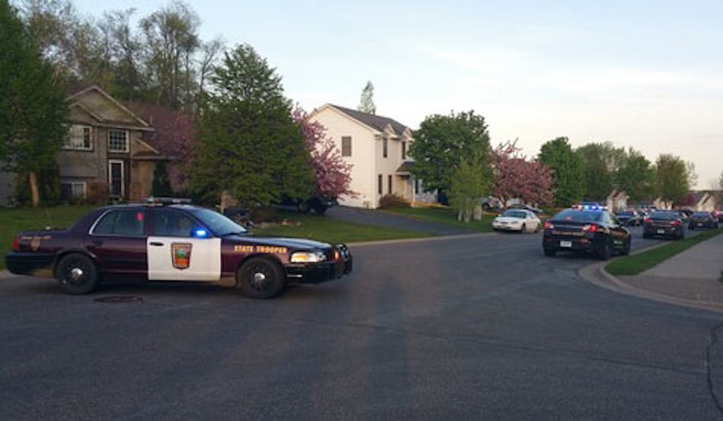 Police cars filled Mayfield Avenue Ne. after reports of the shooting in St. Michael on Saturday.