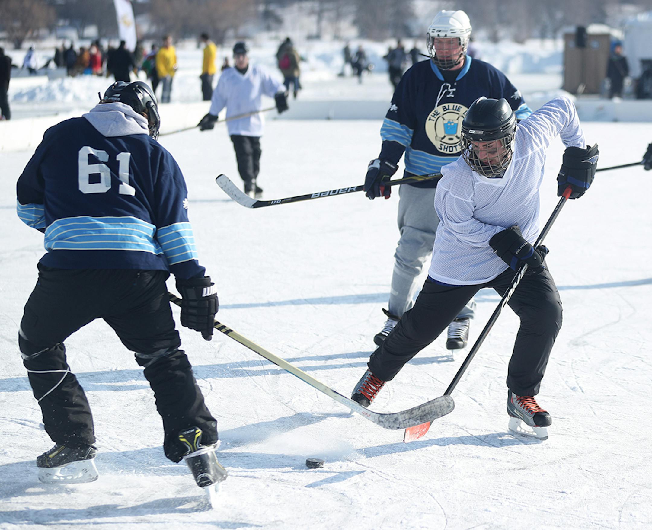 Free agent Brad Wilczynski, right, played for a Chesapeake team in the pond hockey championships on Lake Nokomis.