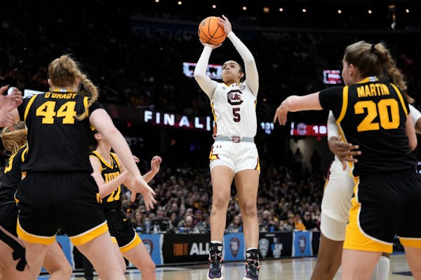 South Carolina guard Tessa Johnson (5), who played high school basketball for St. Michael-Albertville, led her team with 19 points in the title game e