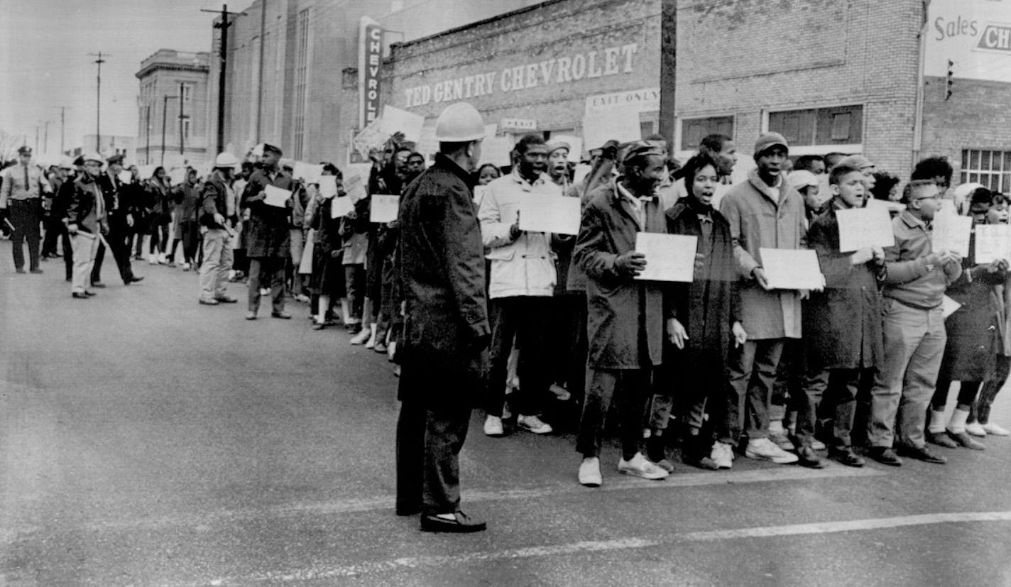 In 1965, marchers in Selma, Ala., lined up to head to jail. They had been arrested during a voter registration protest.	Associated Press