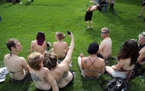 Saying it's a matter of gender equity and freedom of expression, topless demonstrators gathered at Gold Medal Park Sunday August 23, 2015 in Minneapol