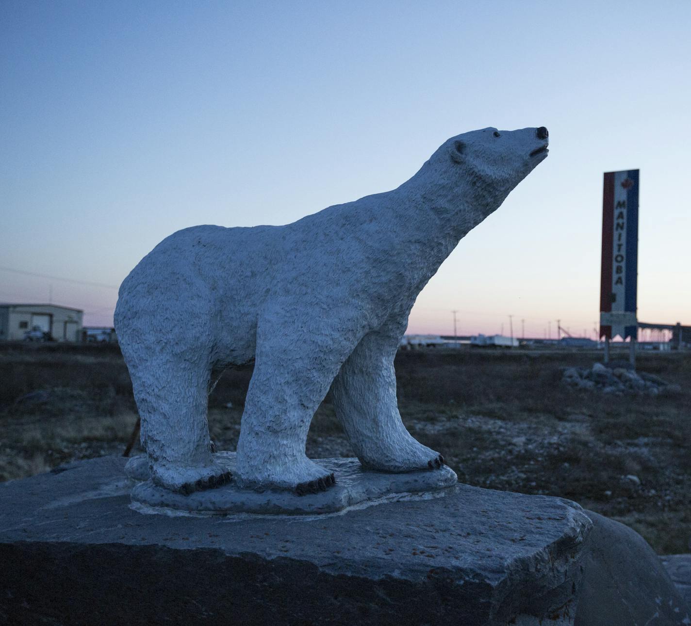 Signs by the Churchill mill in Churchill, Canada, June 14, 2014. A warming planet means less ice coverage of the Arctic Sea, which leaves polar bears with less time and less ice for hunting seals. But they have discovered a new menu option: snow geese. (Michael Kirby Smith/The New York Times) ORG XMIT: XNYT23