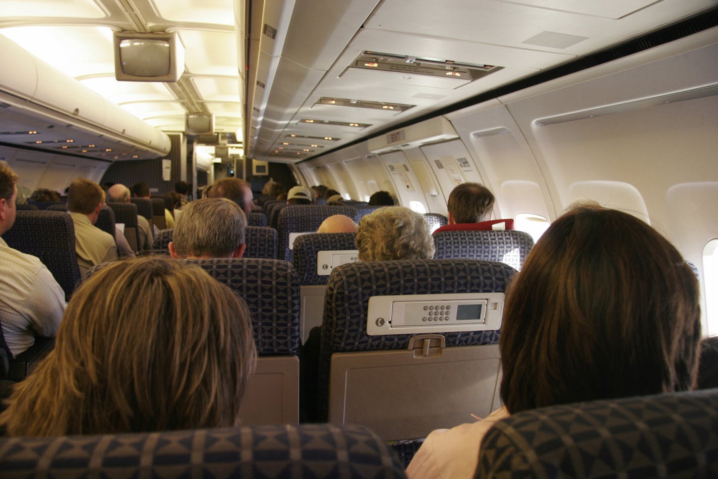 credit: iStock Passengers have lots of company on this crowded airplane.