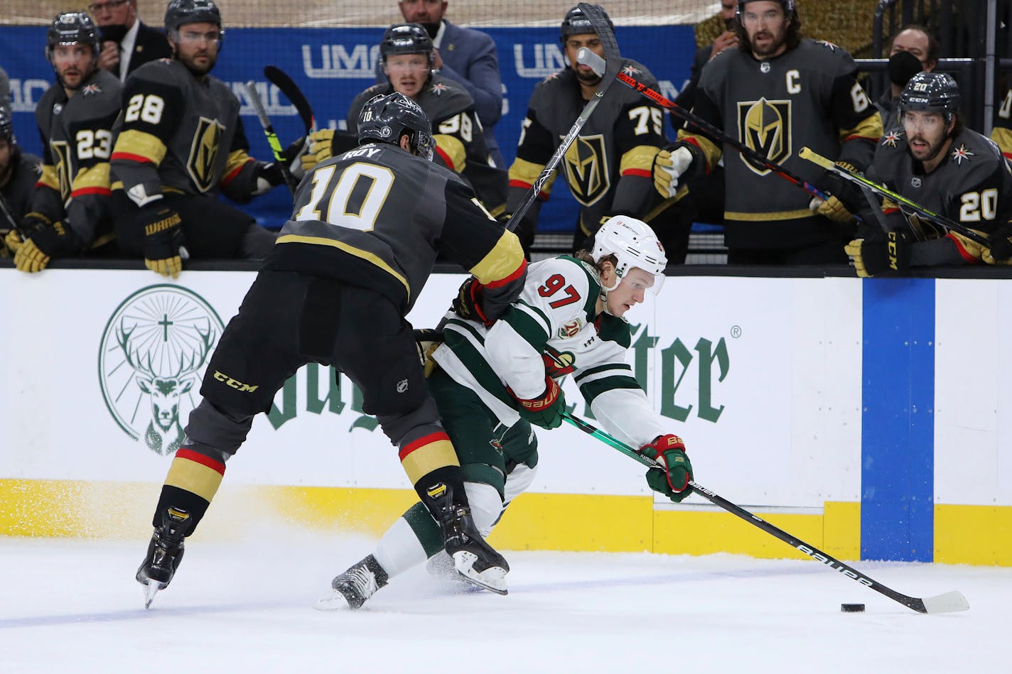 Wild left wing Kirill Kaprizov vies for the puck against Golden Knights center Nicolas Roy during the second period of Game 7