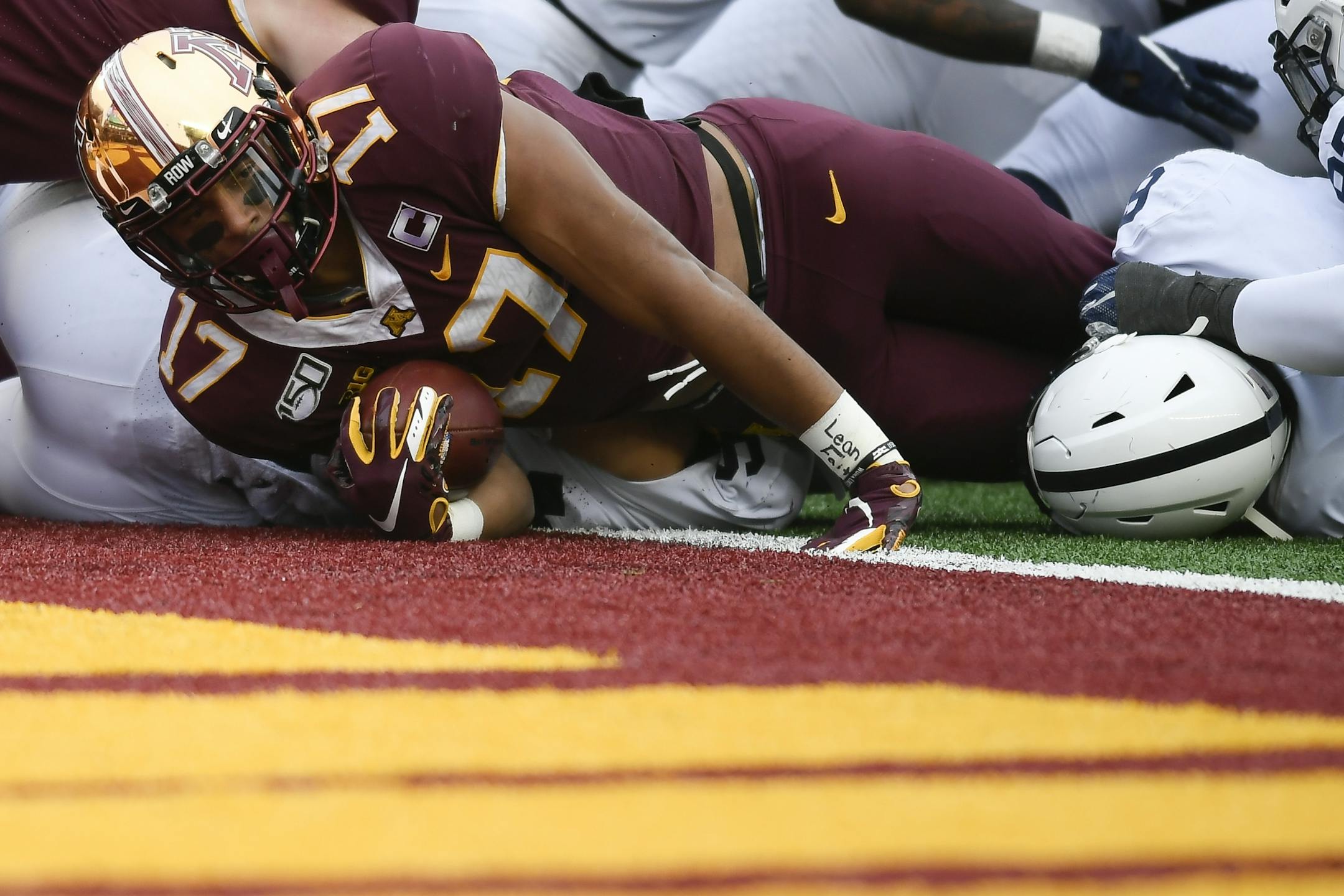 Minnesota Gophers wide receiver Seth Green (17) looked to the sideline official for a touchdown call after scoring on a fourth quarter running play against the Penn State Nittany Lions.