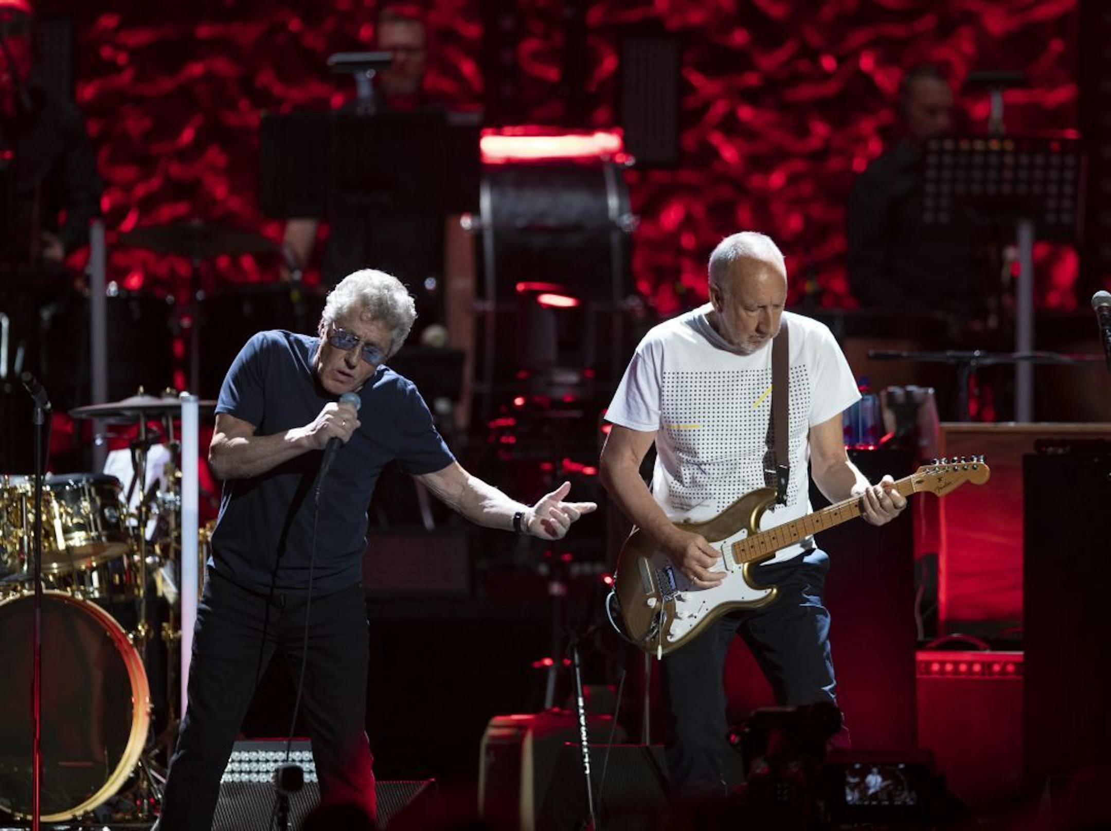 Lead singer Roger Daltrey with guitarist Pete Townshend during Amazing Journey early in The Who's show at Xcel Friday night.