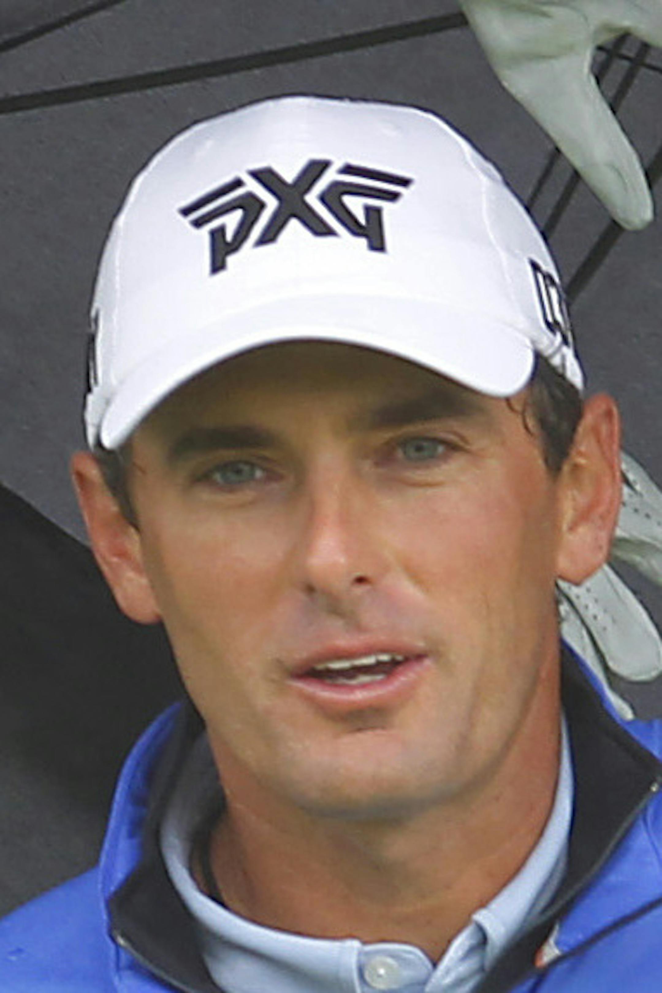Charles Howell III walks off the course during a rain delay in the final round of the Farmers Insurance Open at Torrey Pines in San Diego, Calif., Sunday, Jan. 31, 2016. (K.C. Alfred/The San Diego Union-Tribune via AP) MANDATORY CREDIT