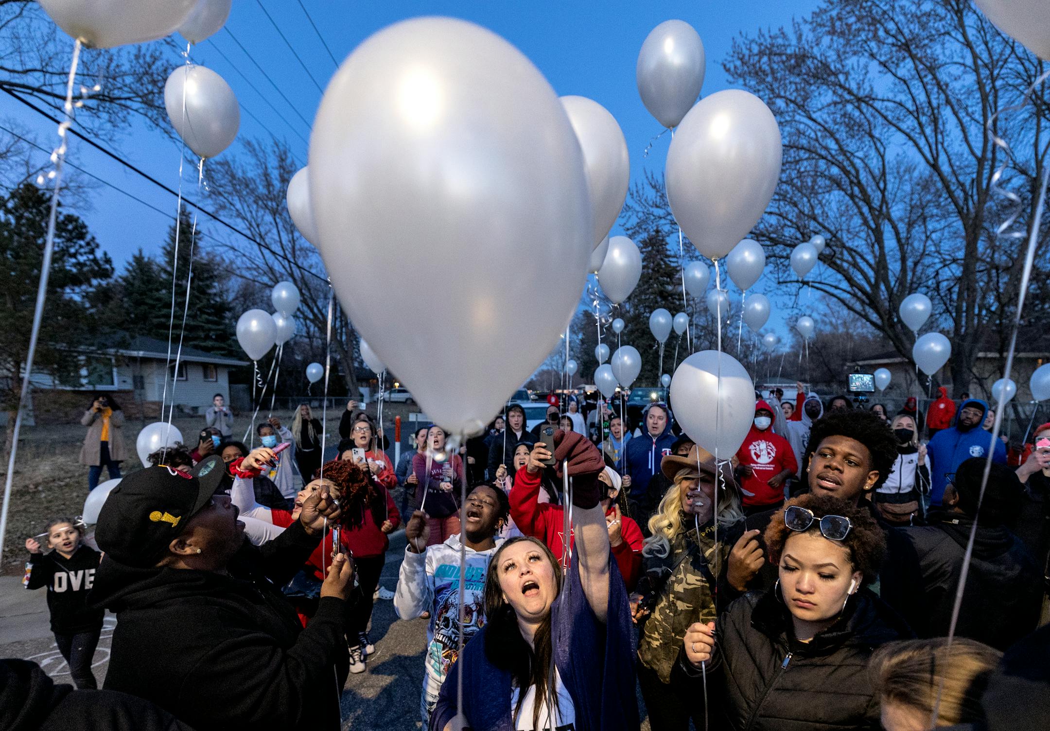 Katie Wright, mother of Daunte Wright, and attendees release balloons at a Vigil honoring Daunte Wright on one-year anniversary of his death Monday, April 11, in Brooklyn Center, Minn.