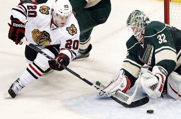 Wild goalie Niklas Backstrom made a save against Brandon Saad in the third period. Chicago beat Minnesota by a final score of 1-0.