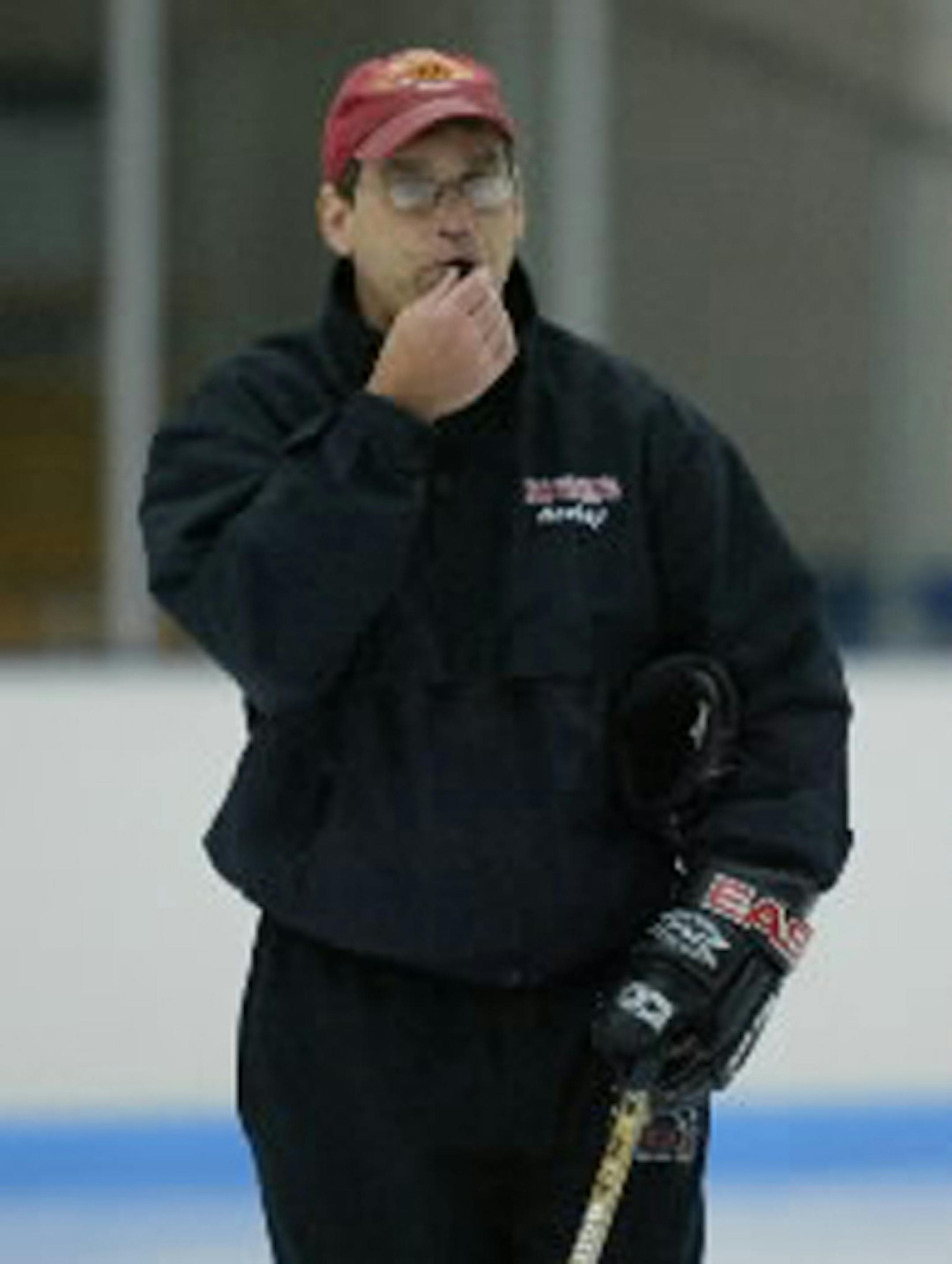 Duluth East boys' hockey coach Mike Randolph