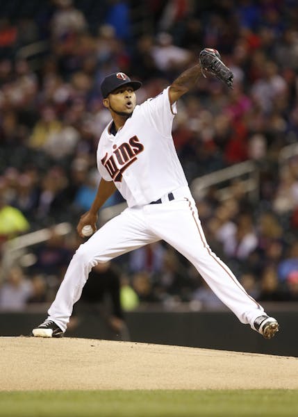 Minnesota Twins pitcher Ervin Santana throws against the Detroit Tigers during the first inning in the second game of a baseball doubleheader Thursday