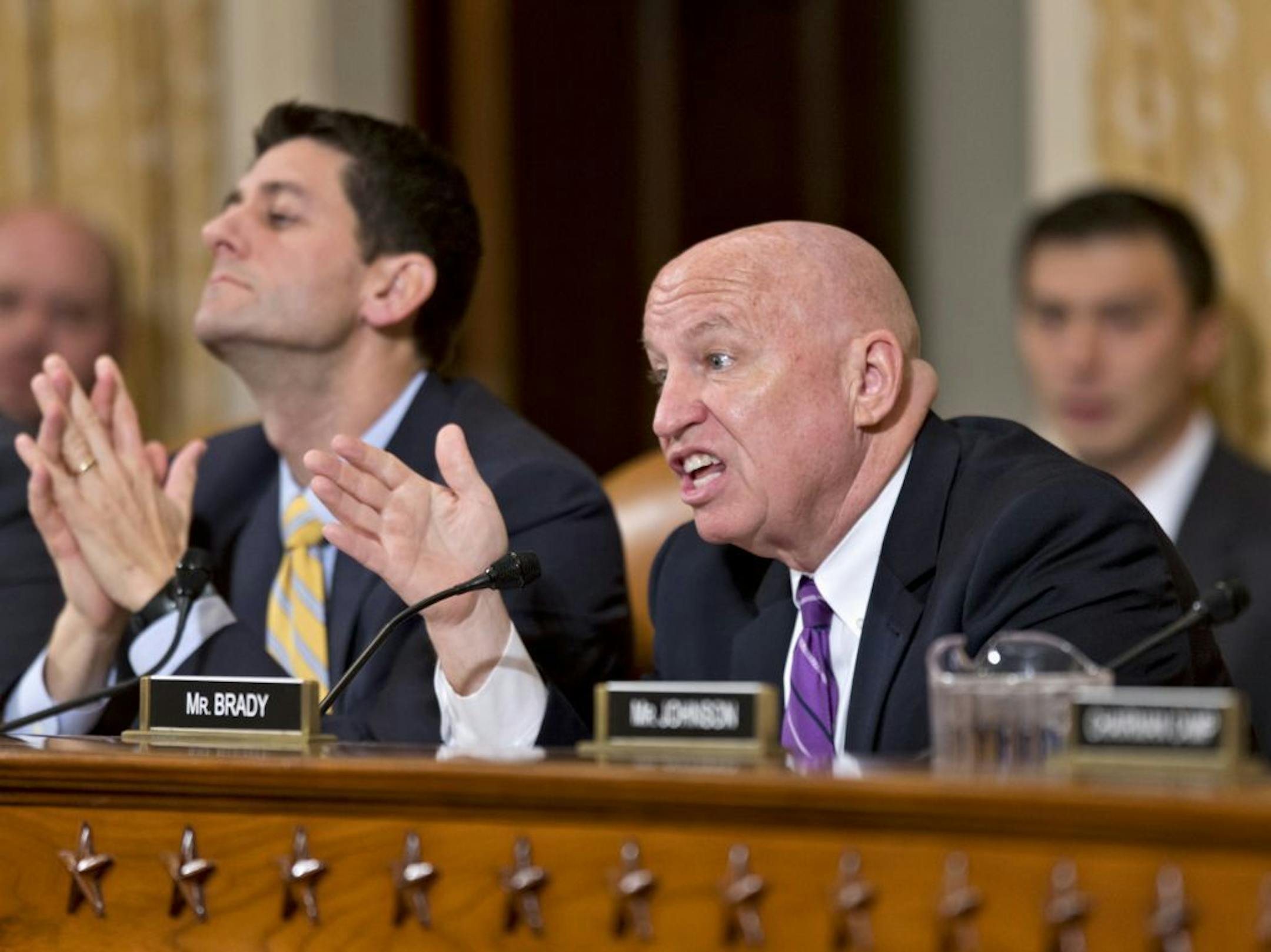 House Ways and Means Committee member Rep. Kevin Brady, R-Texas, right, accompanied by fellow committee member Rep. Paul Ryan, R-Wis., left, questions Marilyn Tavenner, the administrator of the Centers for Medicare and Medicaid Services, during the committee's hearing on on Capitol Hill in Washington, Tuesday, Oct. 29, 2013, on problems with the implementation of the Affordable Care Act. As the senior Obama administration official closest to the implementation of the health care law's dysfunctio