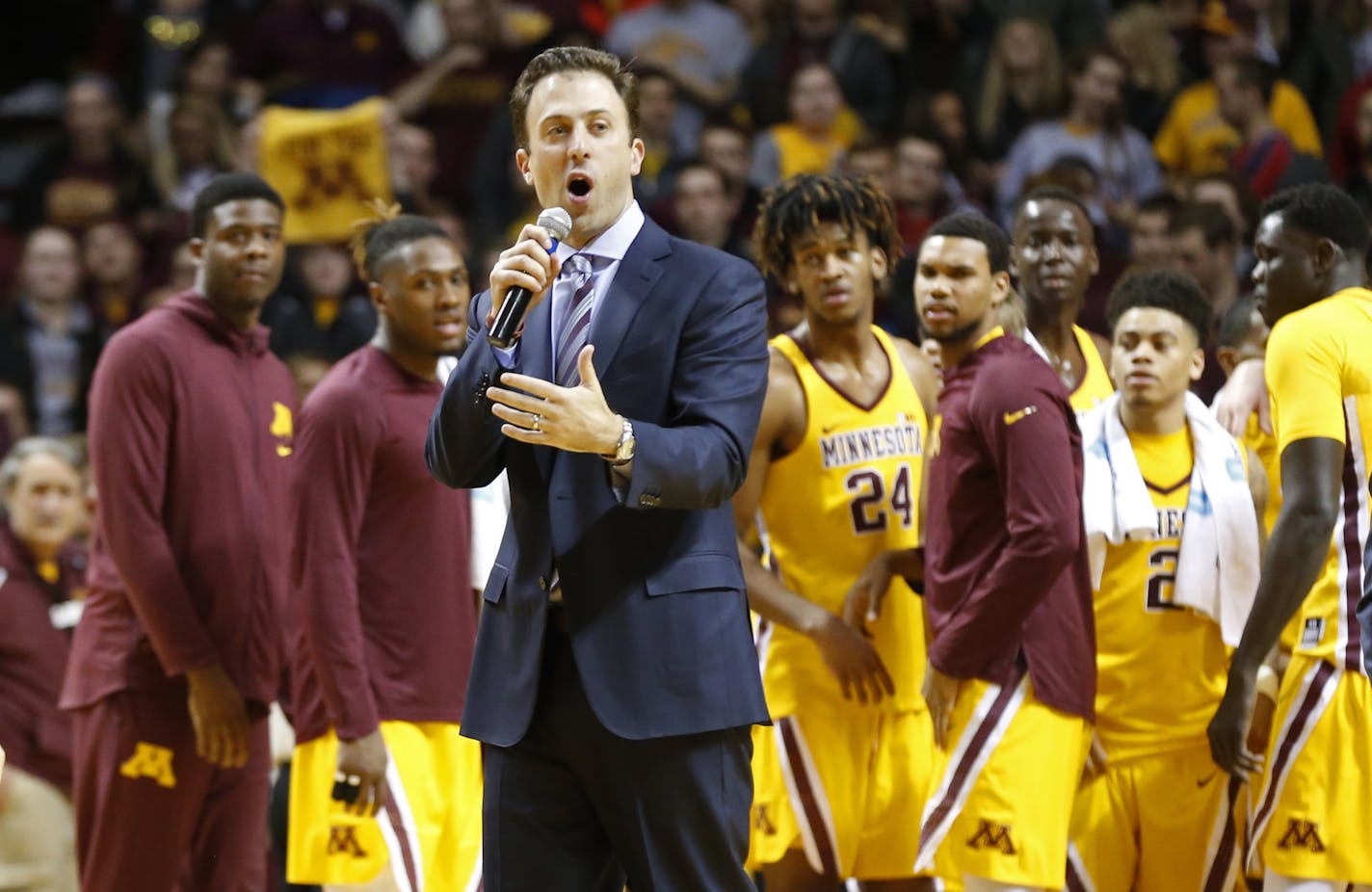 Minnesota head coach Richard Pitino addresses fans after Minnesota beat Nebraska in an NCAA college basketball game Thursday, March 2, 2017, in Minneapolis. (AP Photo/Jim Mone)