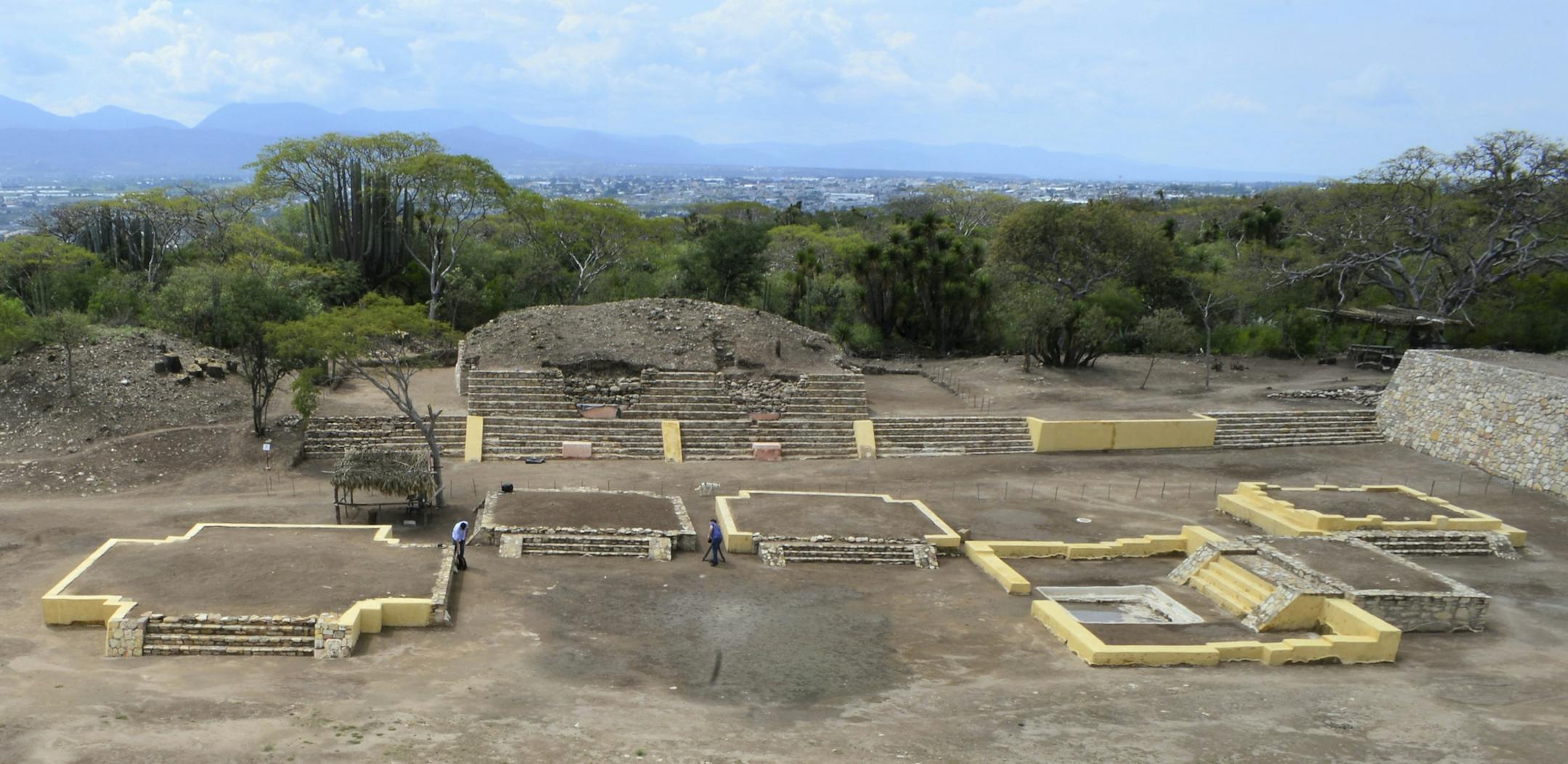 In this 2018 photo provided by Mexico's National Institute of Anthropology and History, INAH, investigators work at the Ndachjian–Tehuacan archaeological site in Tehuacan, Puebla state, Mexico, where archaeologist have identified the first known temple to the Flayed Lord, a pre-Hispanic fertility god depicted as a skinned human corpse. Although depictions of the god, Xipe Totec, had been found before in other cultures, a whole temple had never been discovered. (Meliton Tapia Davila/INAH v