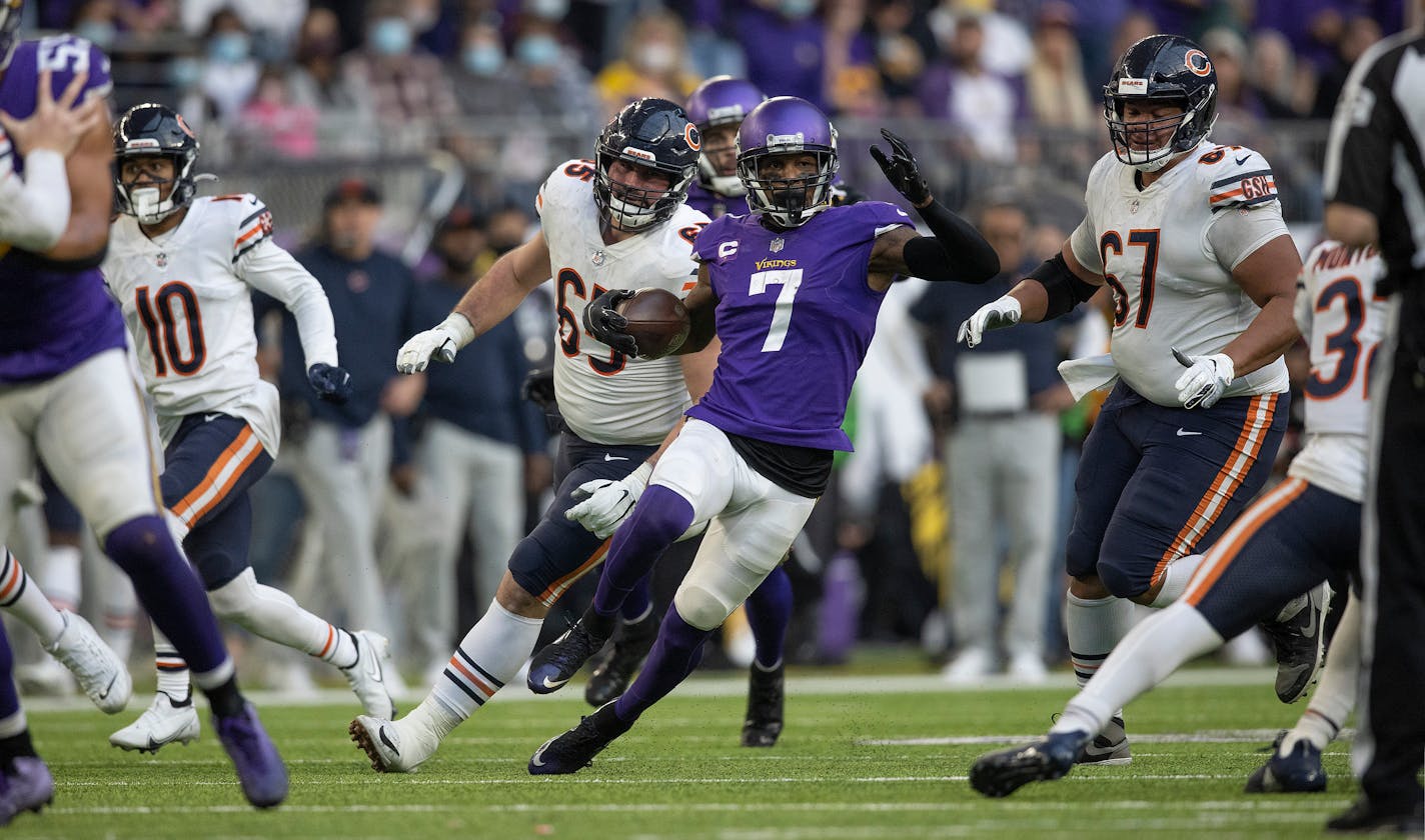 Minnesota Vikings cornerback Patrick Peterson, (7) runs back a 67-yard interception for a touchdown in the fourth quarter, at U.S. Bank Stadium in Minneapolis on Sunday, Jan. 9, 2022. (Jerry Holt/Minneapolis Star Tribune/TNS) ORG XMIT: 37083536W