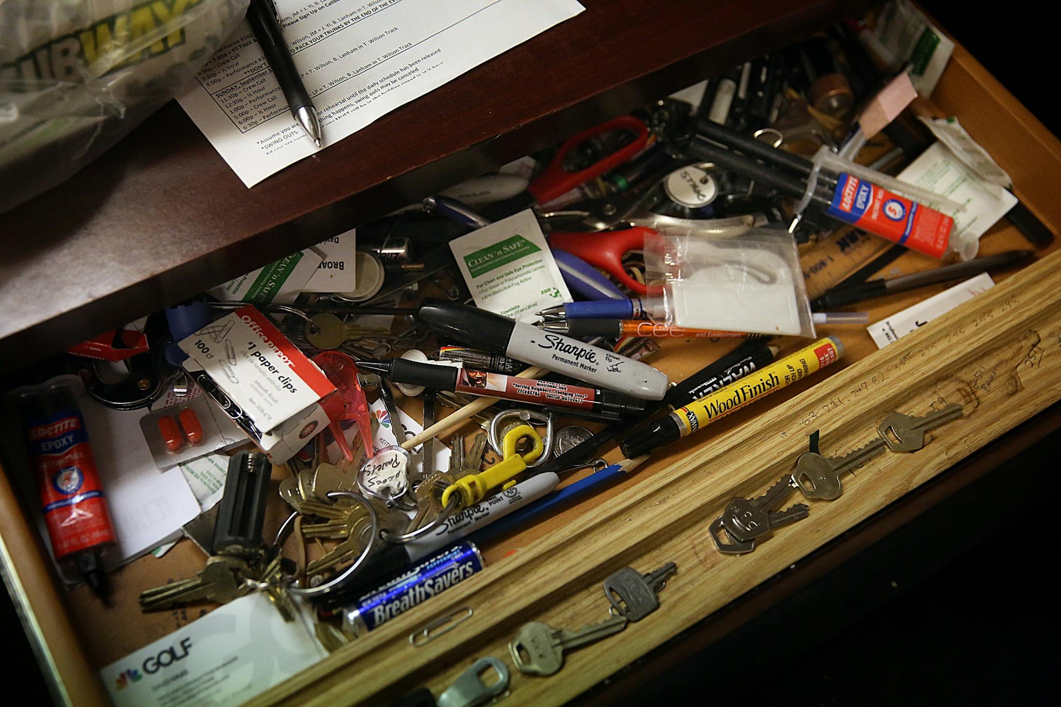 Dave Marietta, is a third-generation stagehand and longtime "House man" who helps to keep the restored Hennepin Theater Trust theaters running. Keys and other miscellaneous items fill Marietta�s desk drawers.