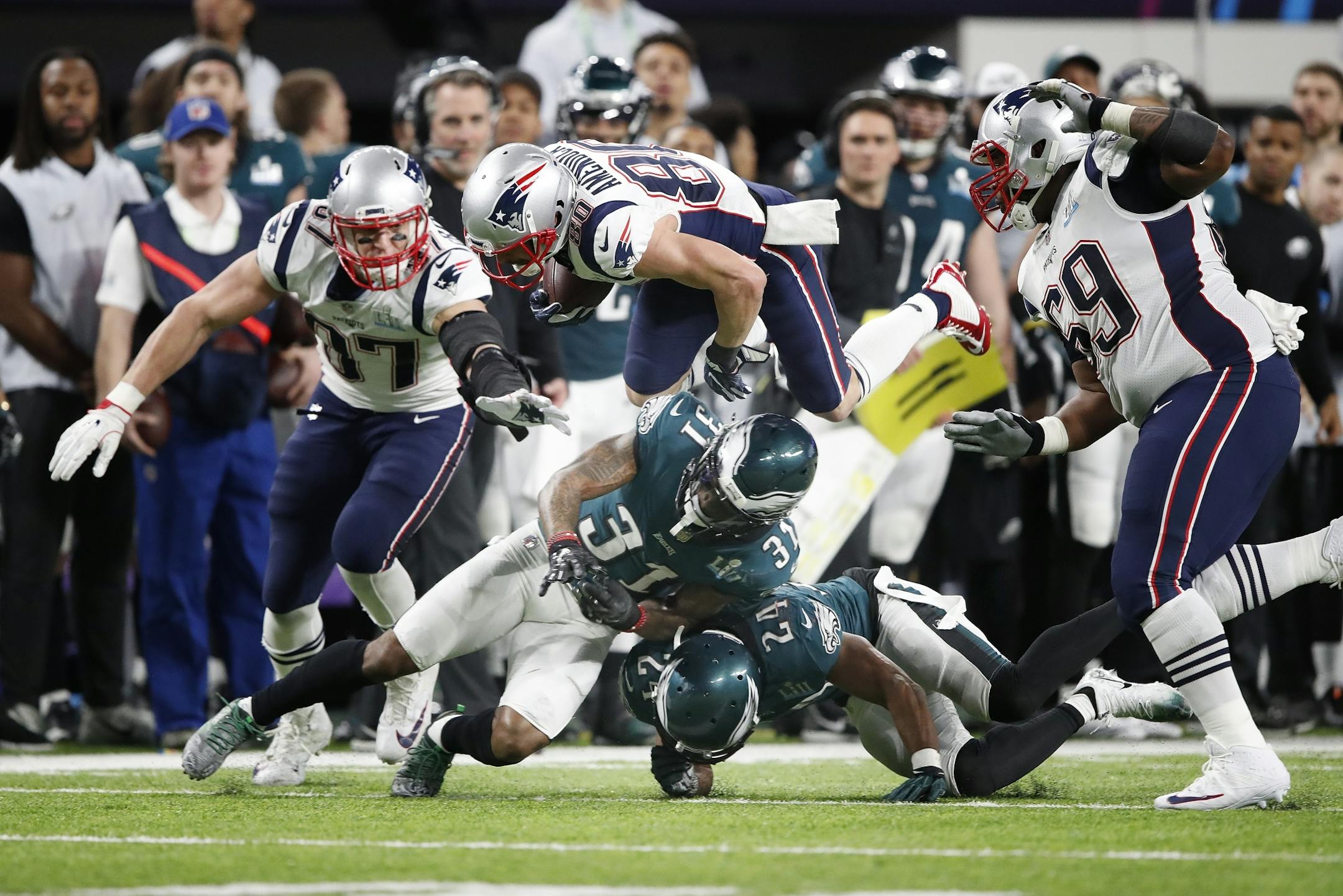 New England Patriots wide receiver Danny Amendola (80) was upended by Philadelphia Eagles cornerback Jalen Mills in the first half of Super Bowl LII.