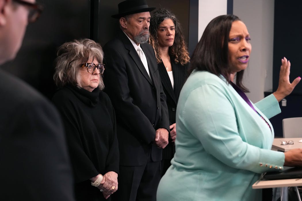 Colleen Bellamy, center left, and Louis Bellamy, center right, listen as Del Shea Perry spoke about their son, Lucas Bellamy, who died in the Hennepin County jail, and Perry’s son Hardel Sherrell, who died in the Beltrami County Jail.